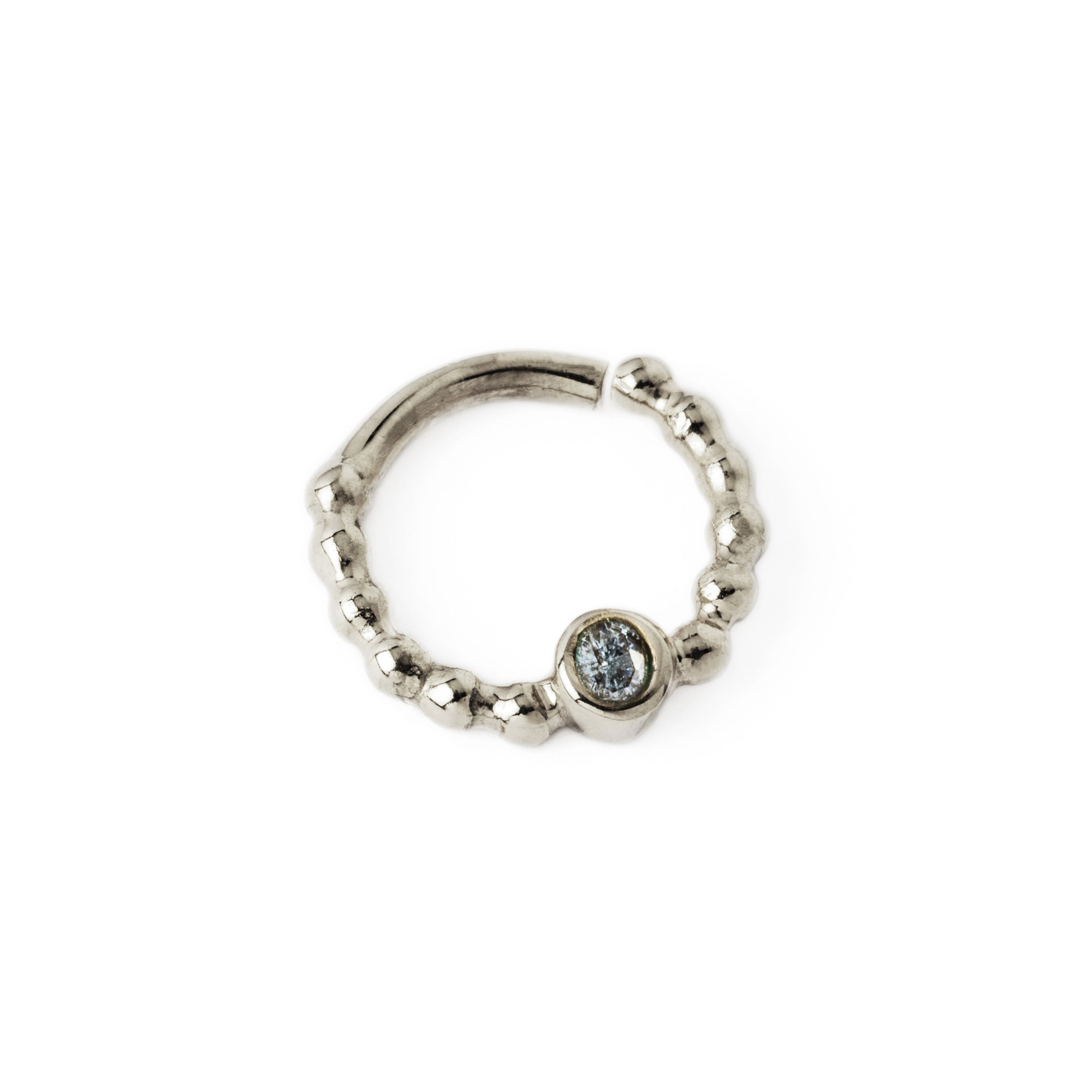 sterling silver dotted septum ring with Lolite gemstone right side view