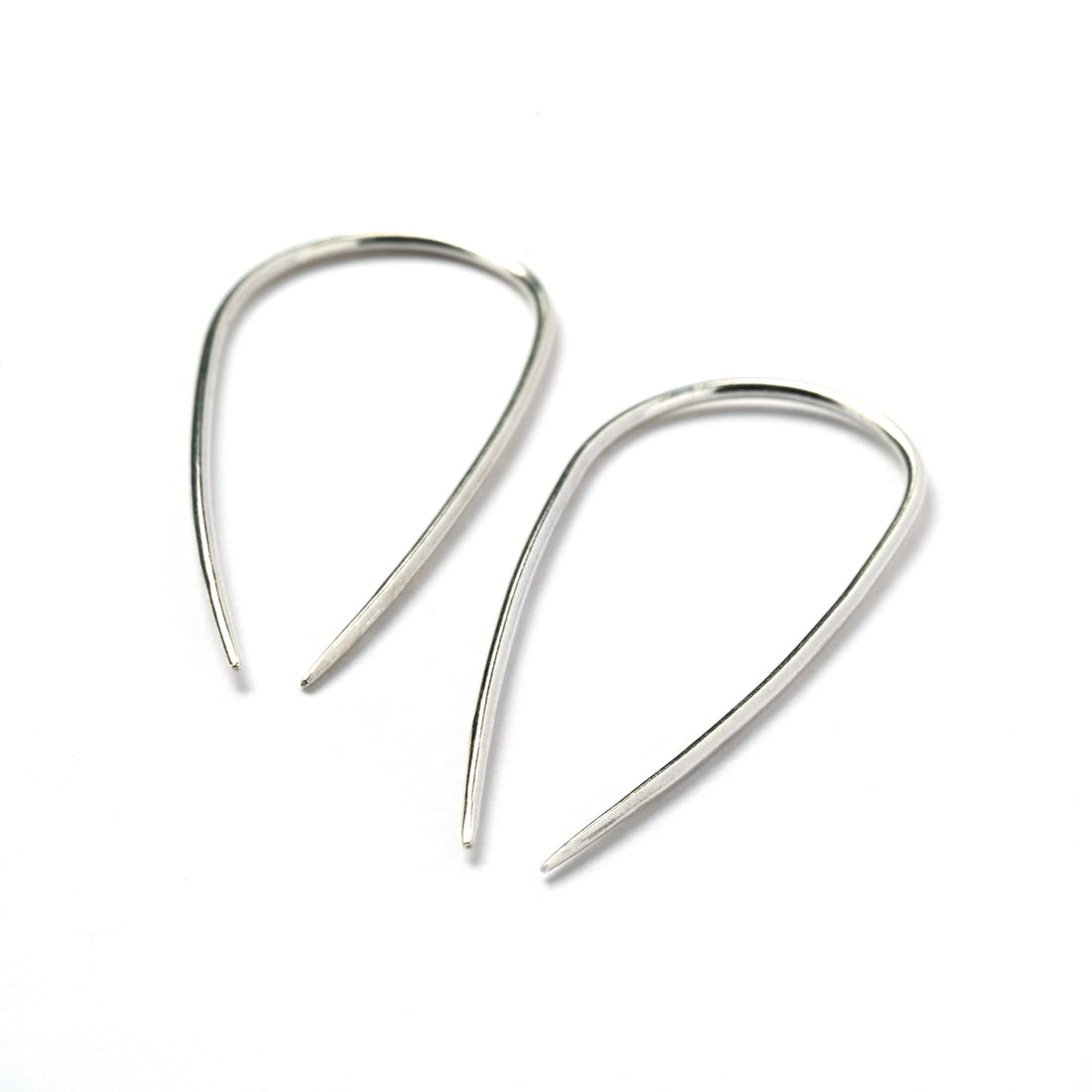 pair of silver wire long horseshoe earrings right side view
