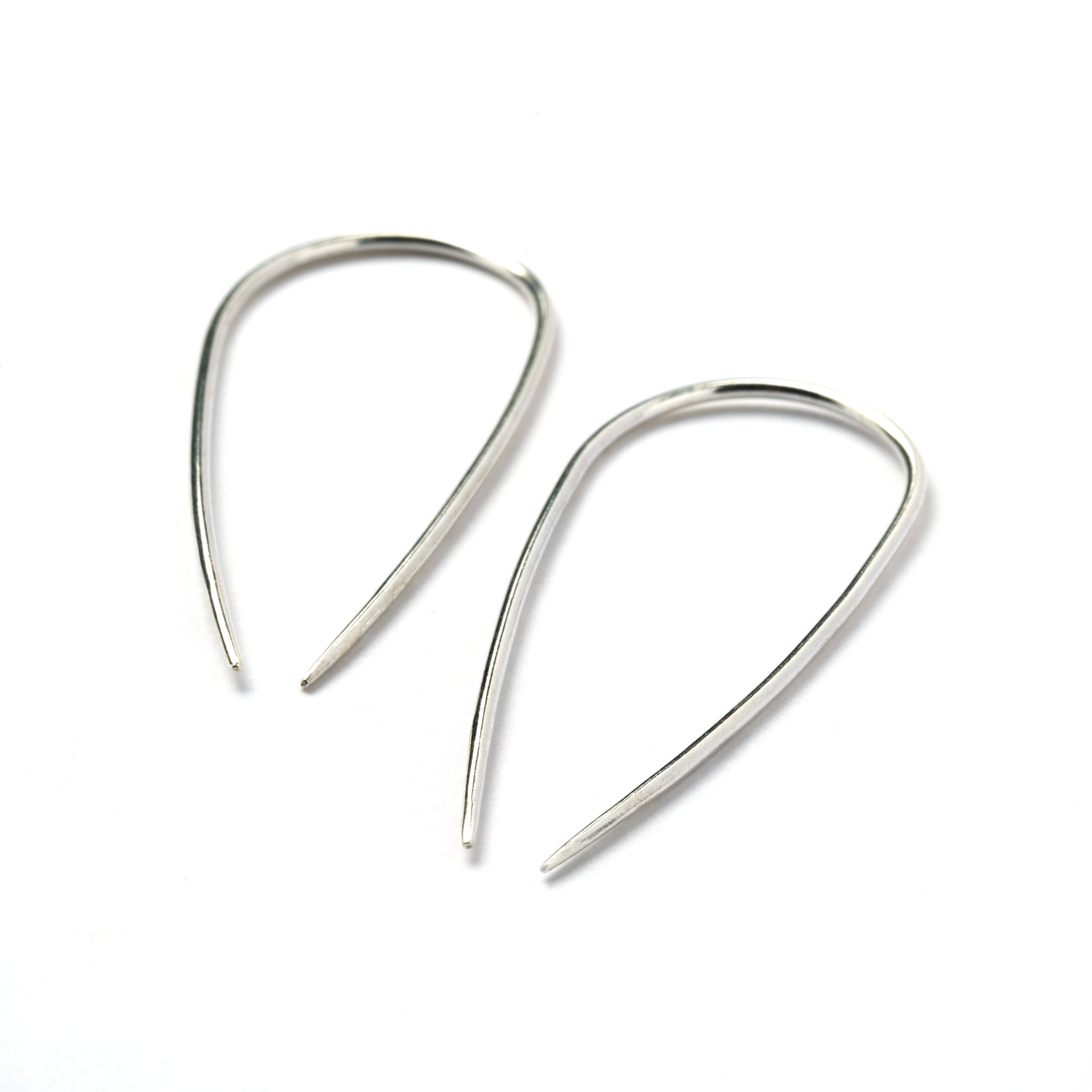 pair of silver wire long horseshoe earrings right side view