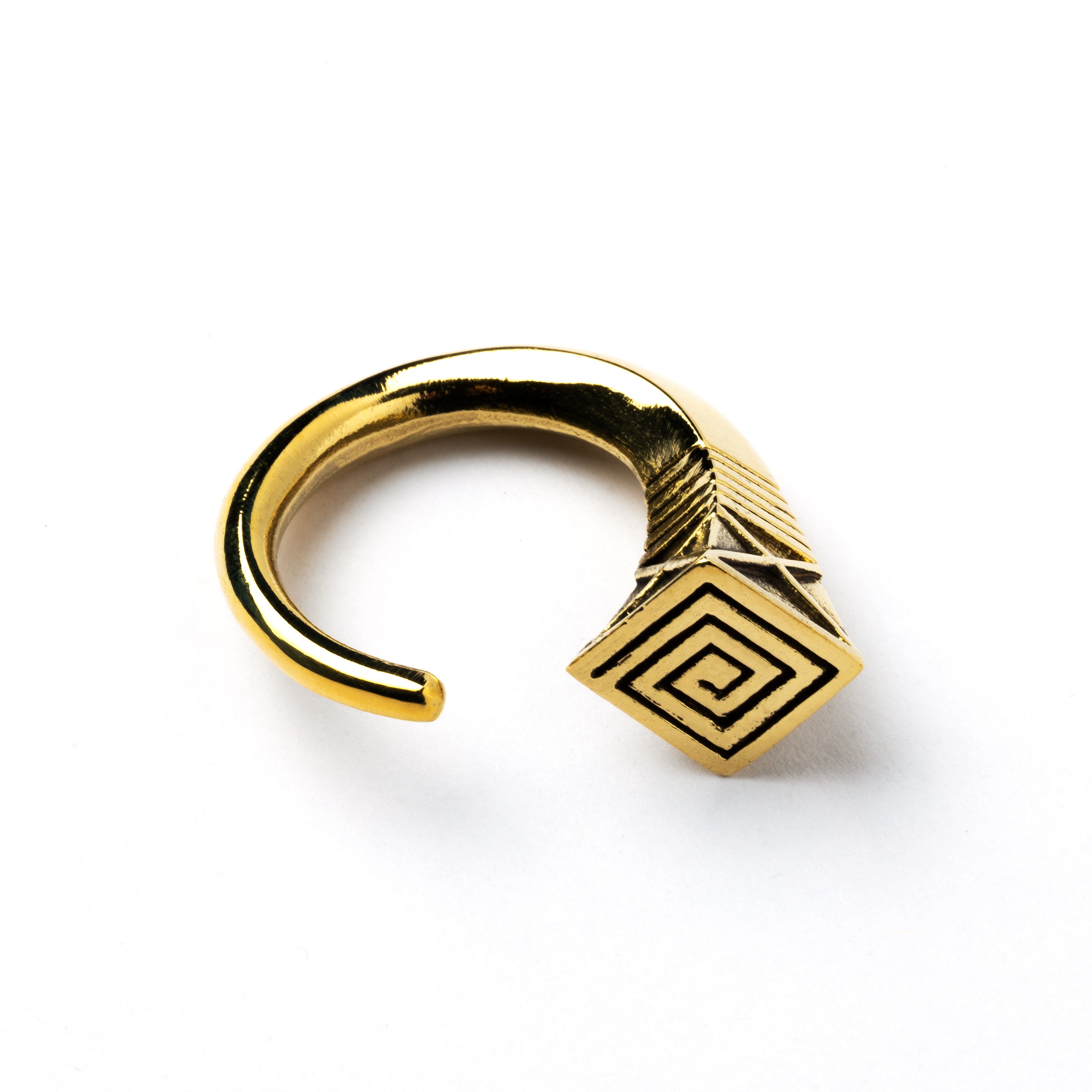single gold brass hook weight hanger with geometric design side close up view