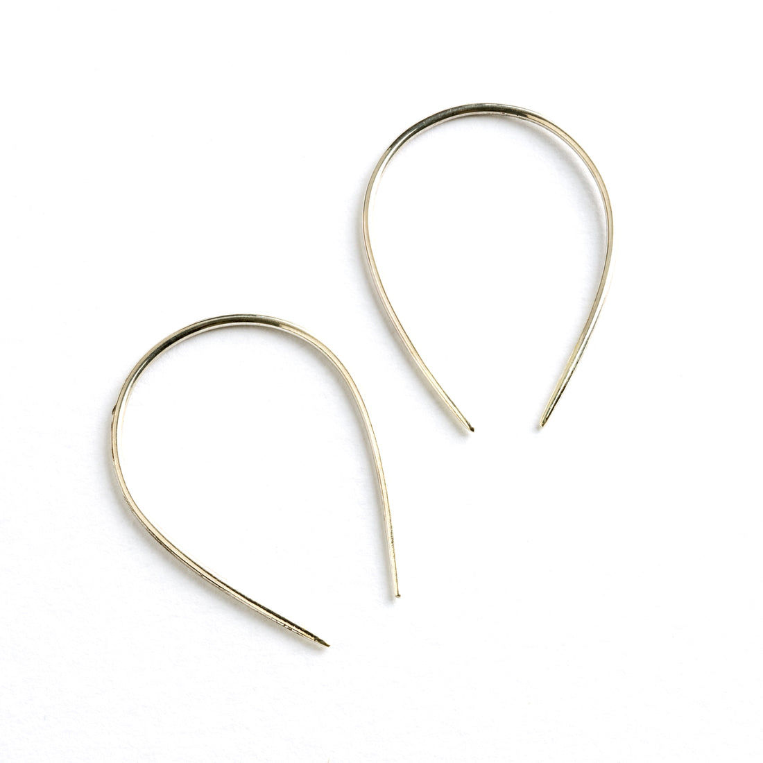 pair of 2mm silver wire horseshoe earrings side view