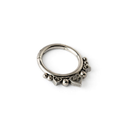 surgical steel hinged segment ring with spheres and hearts ornaments side view 