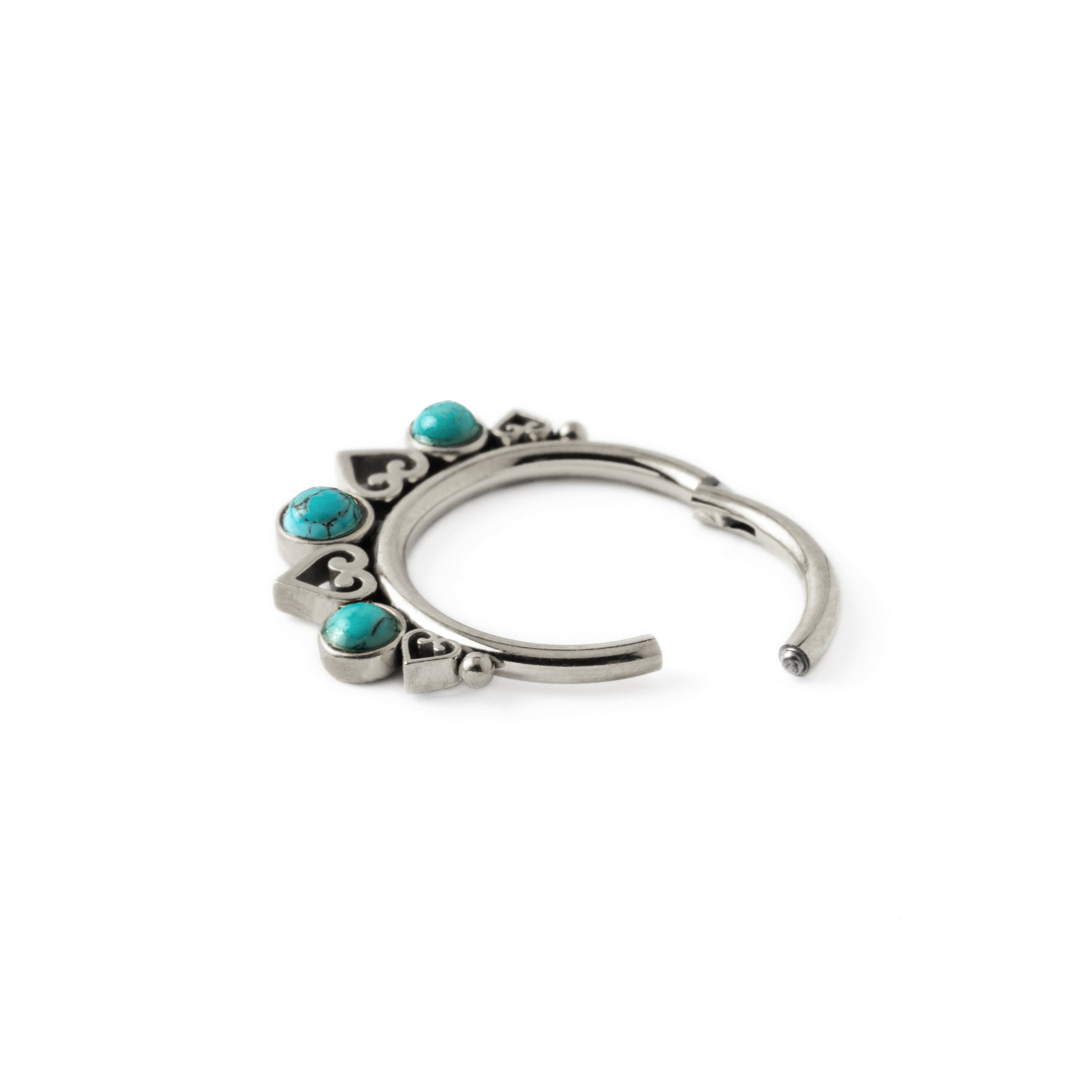 Neptune surgical steel septum clicker with Turquoise hinged segment  view