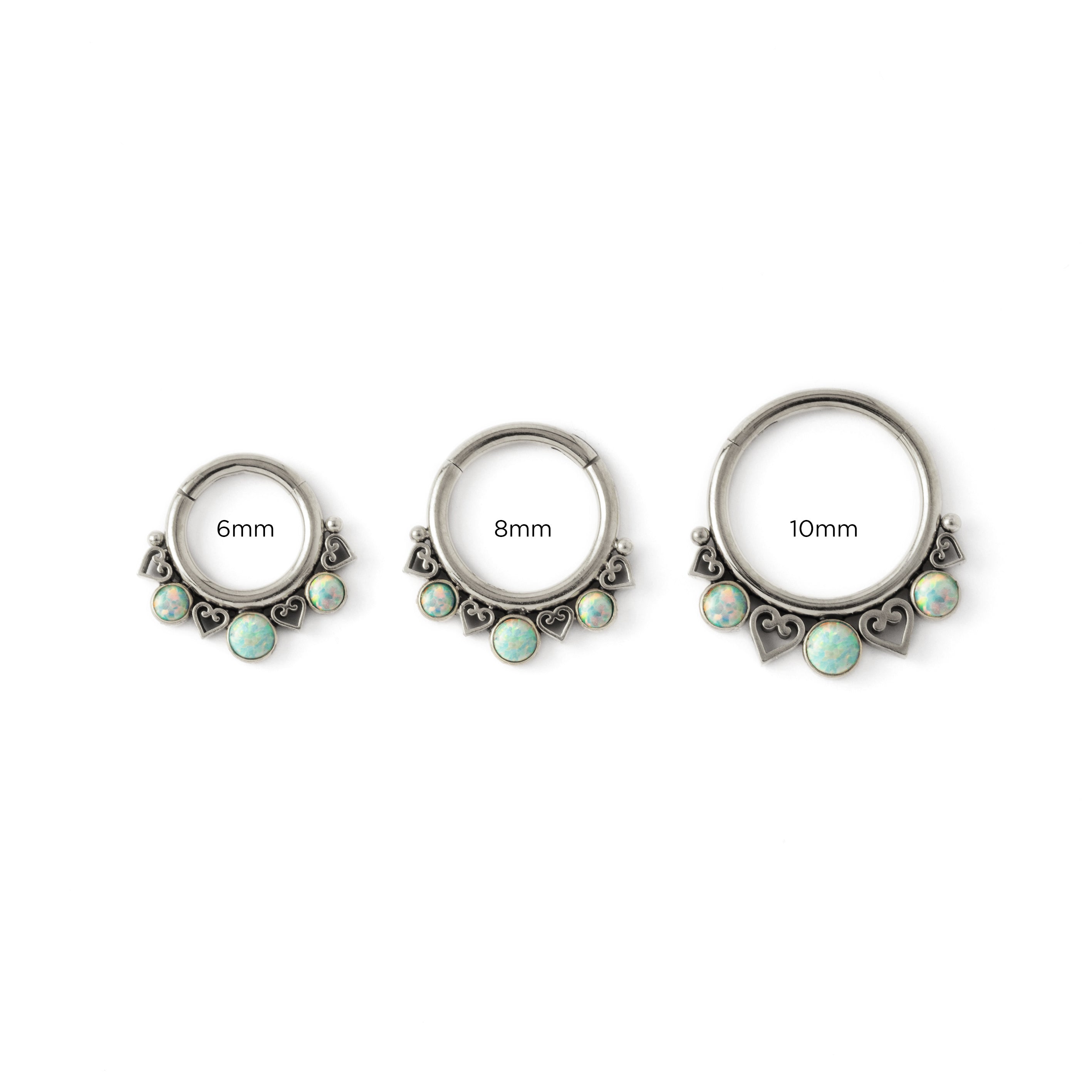 6mm, 8mm, 10mm Neptune surgical steel septum clickers with white Opal frontal view