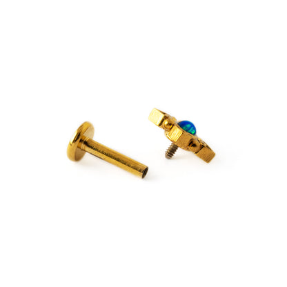 Neptune golden labret with blue opal screw back view