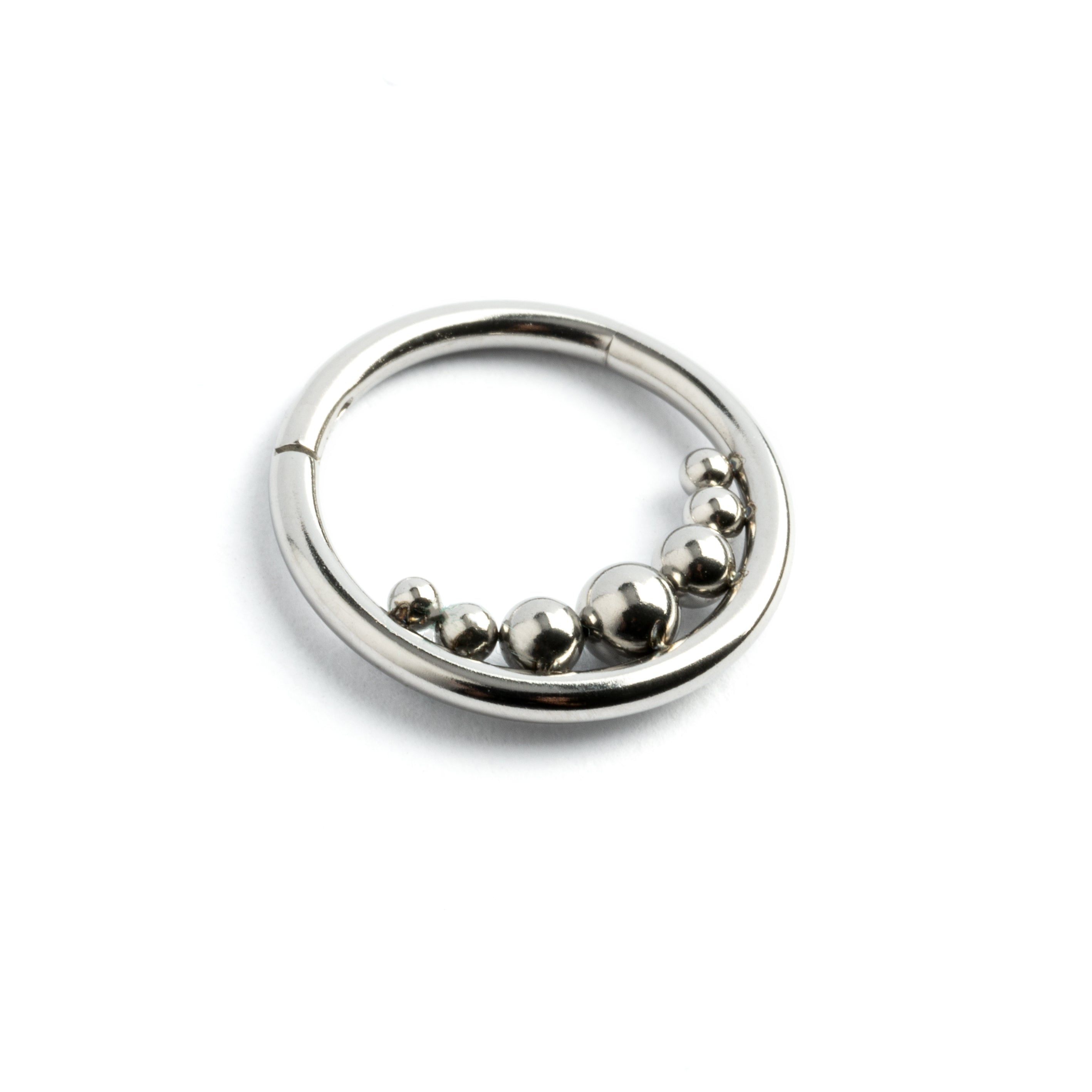 Newton's Cradle surgical steel clicker piercing ring left side view