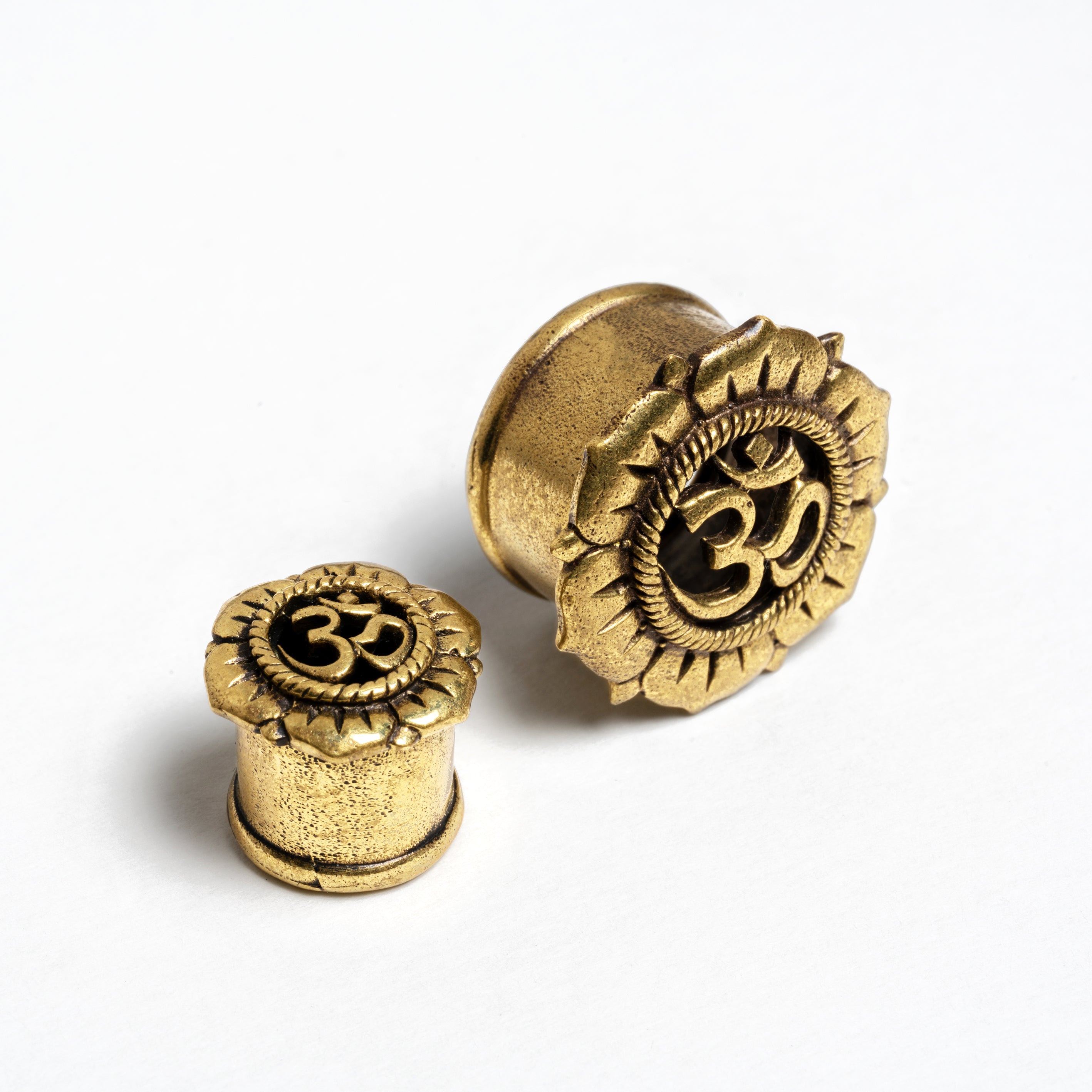 Om Lotus Flower Brass Ear Plugs frontal and sideview