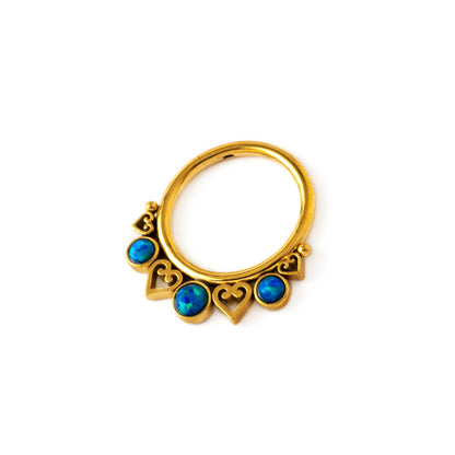 golden neptune septum clicker with trio blue opals left side view