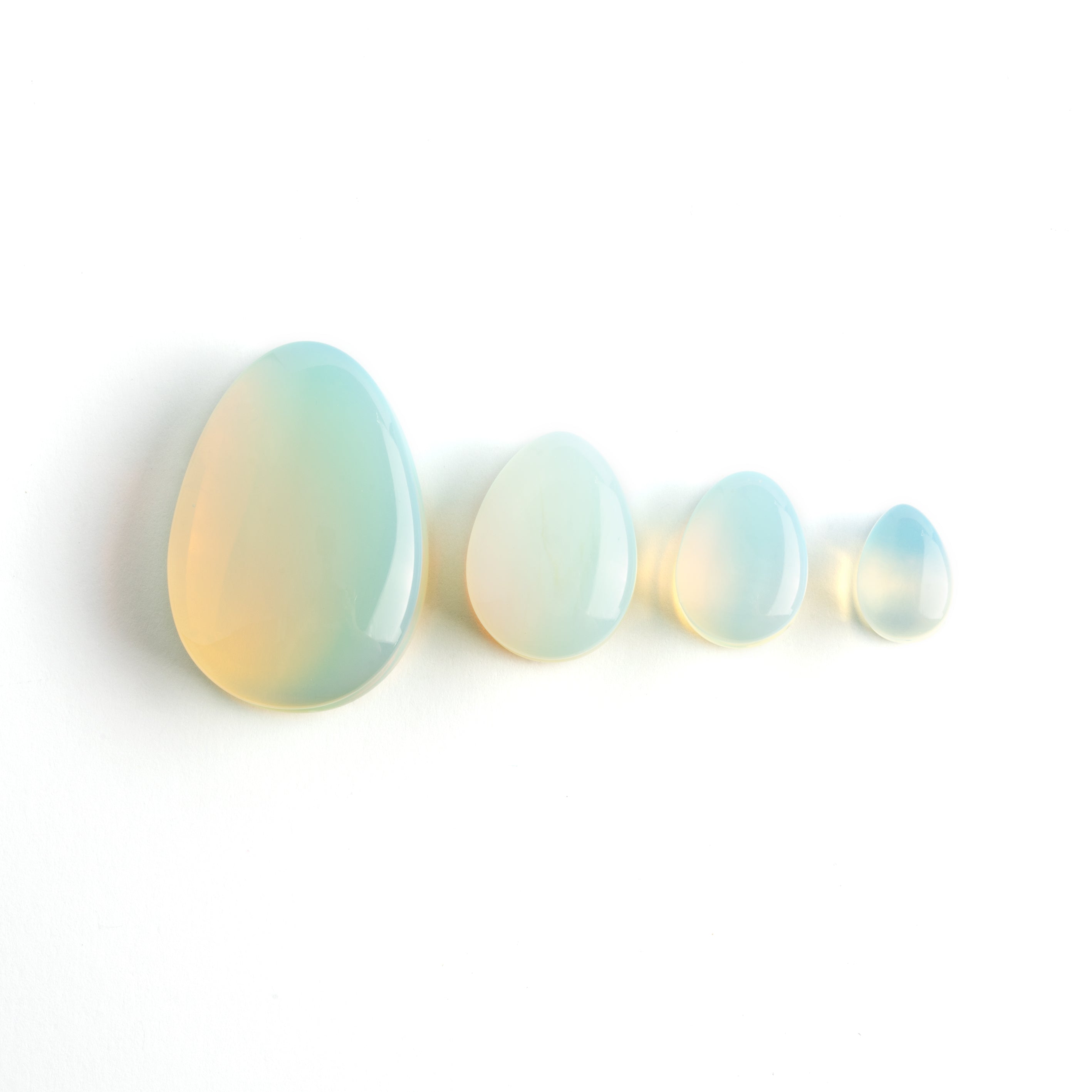 severy sizes of Opalite teardrop ear plugs frontal view
