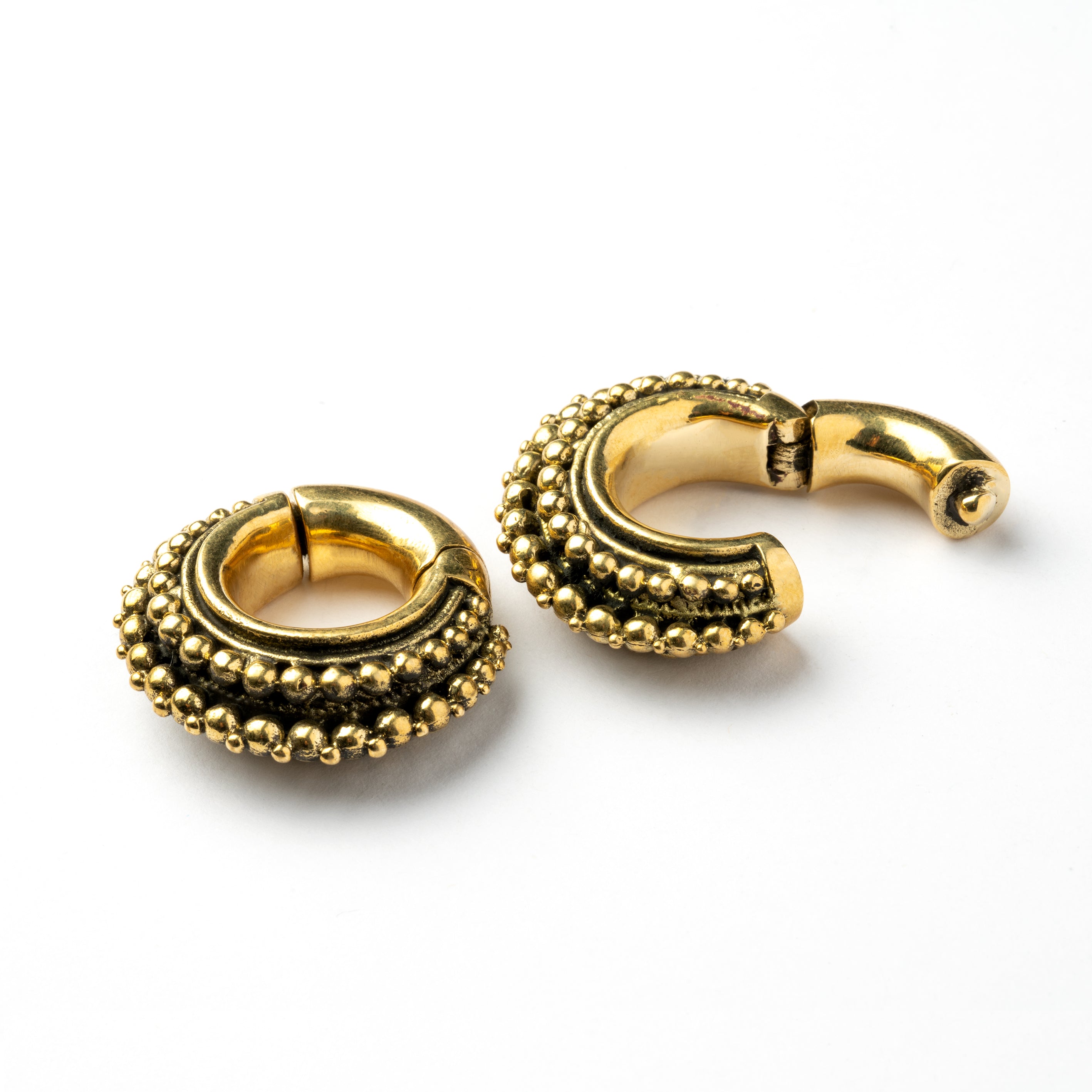 pair of gold brass chunky tribal ear weights hoops locking system side view 