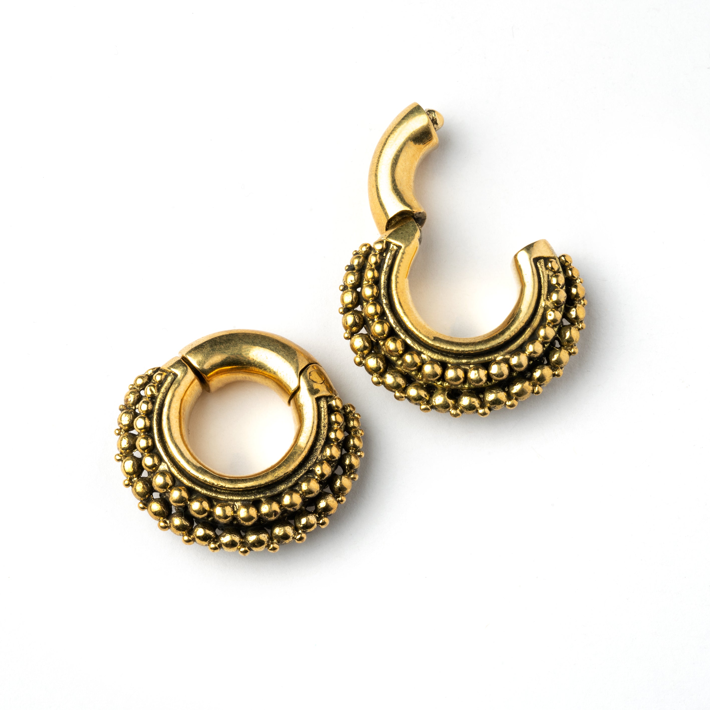 pair of gold brass chunky tribal ear weights hoops locking system front view 