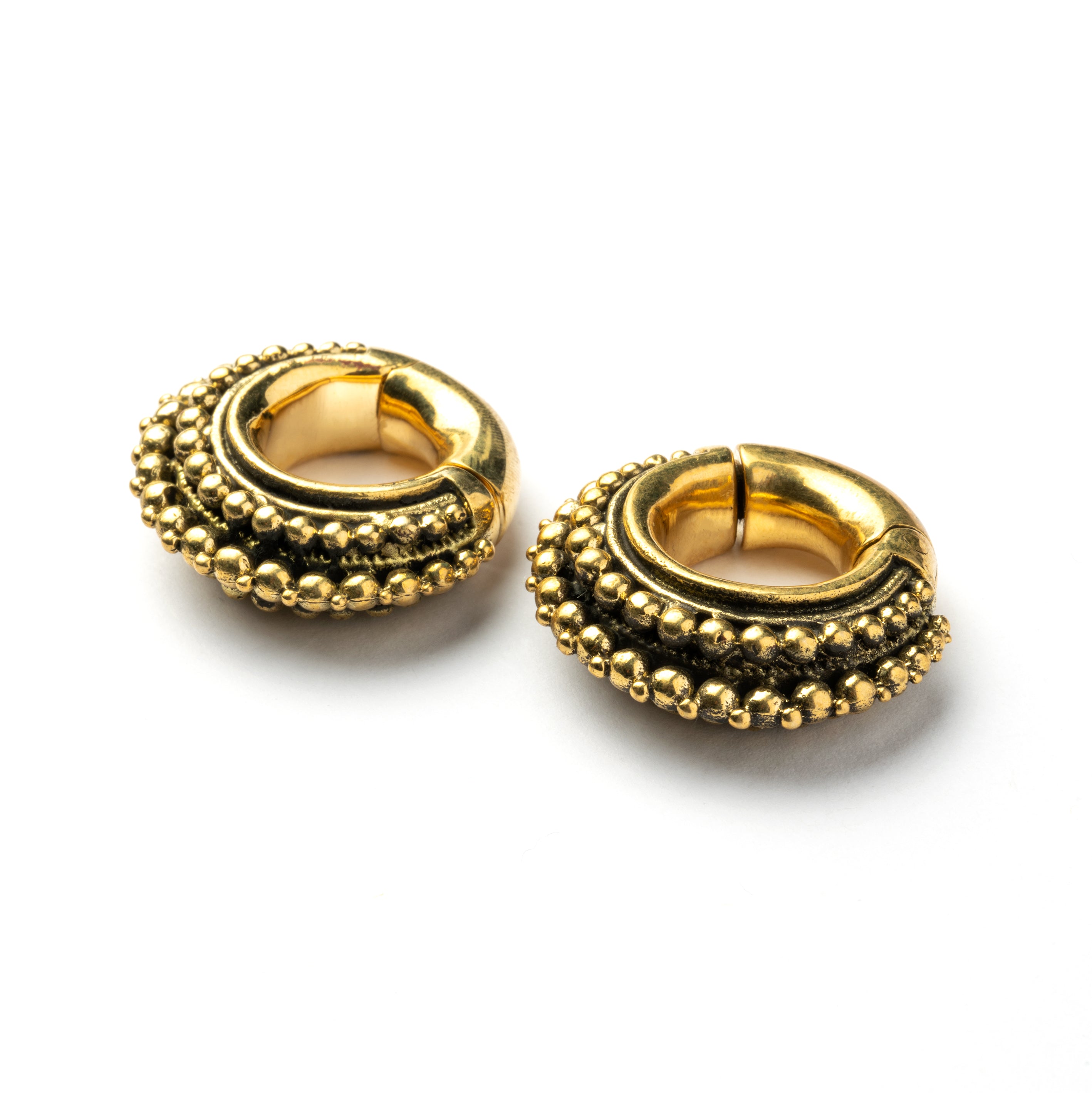 pair of gold brass chunky tribal ear weights hoops  side view 