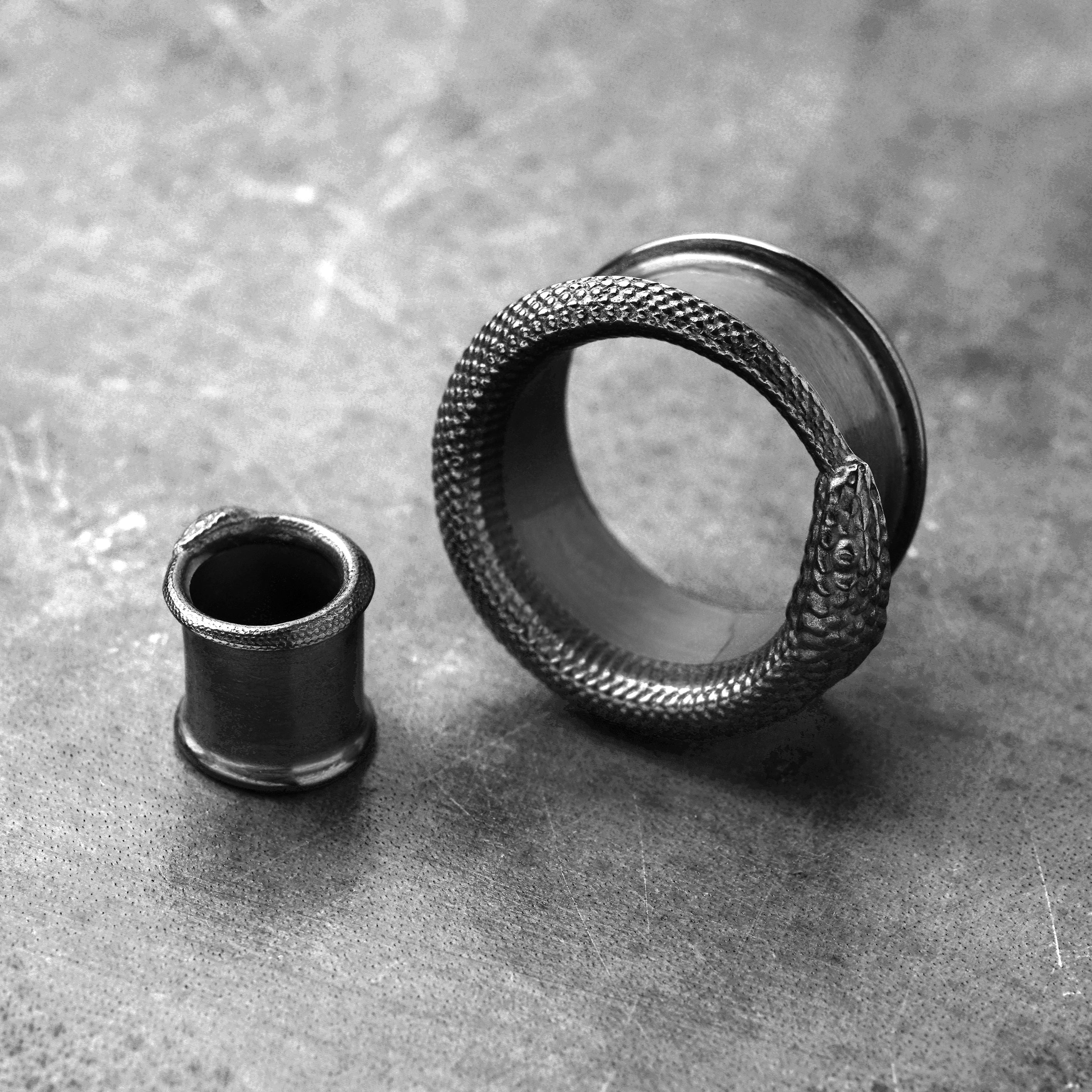 Ouroboros black silver ear tunnels