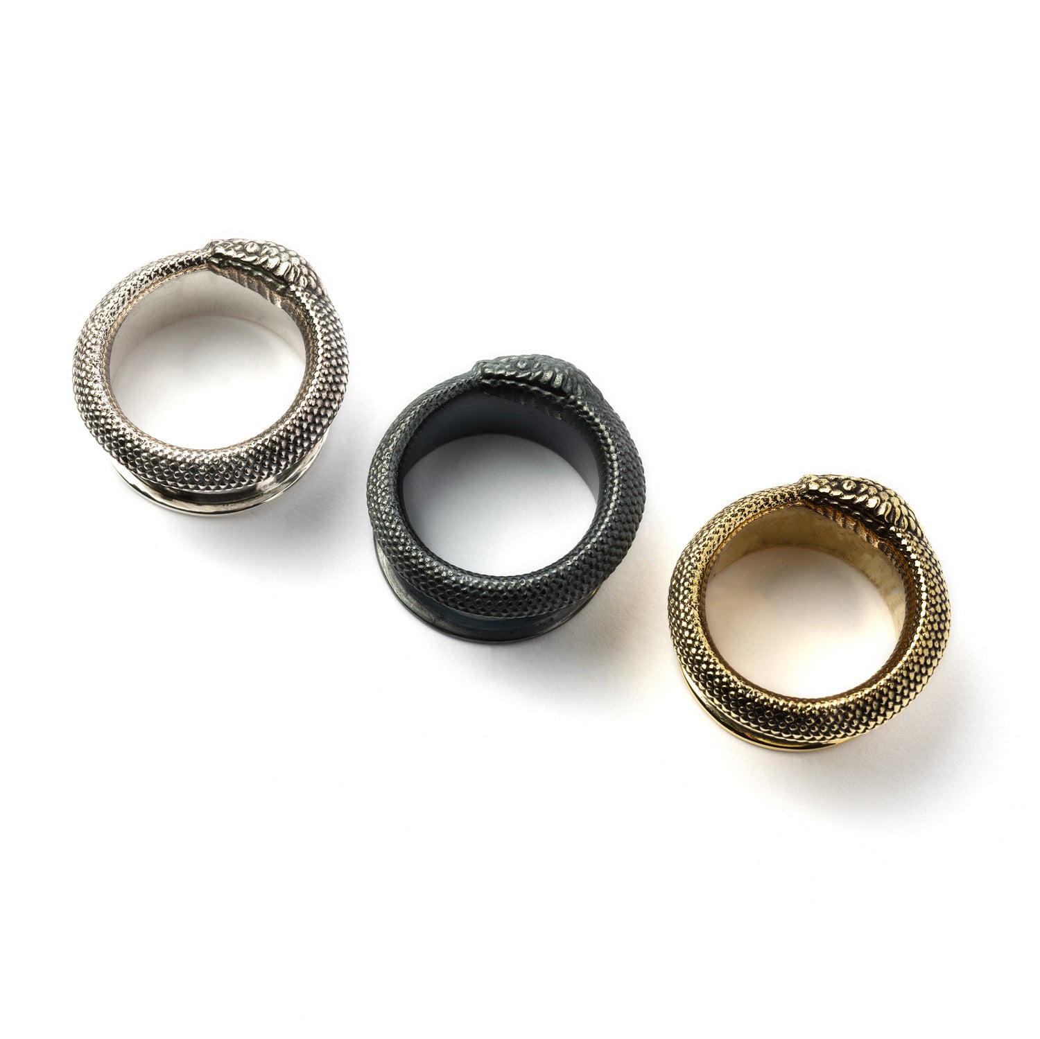 Ouroboros black silver and gold ear tunnels