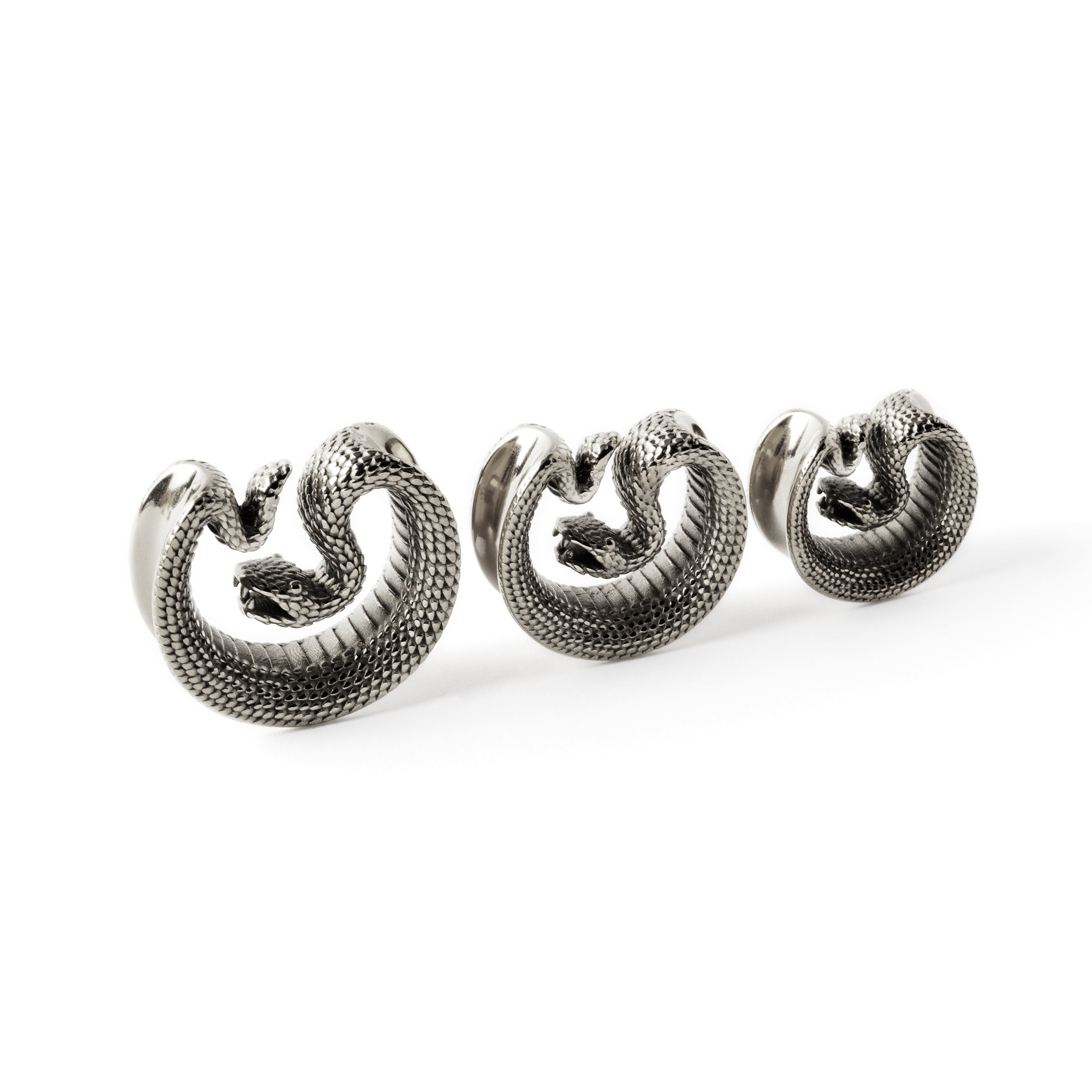 different sizes of surgical steel python snake plug tunnels