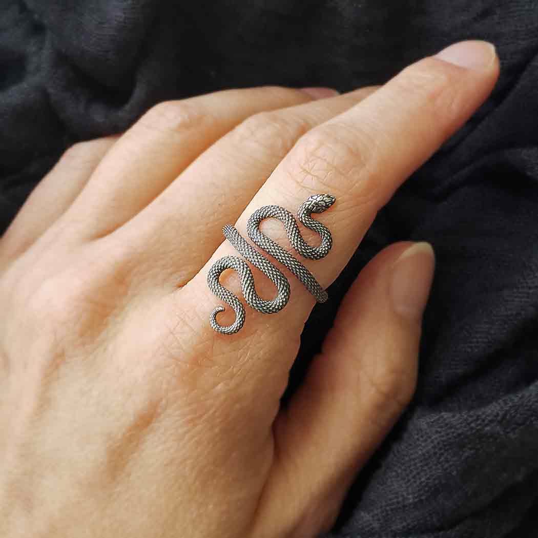model wearing sterling silver Eden snake adjustable ring