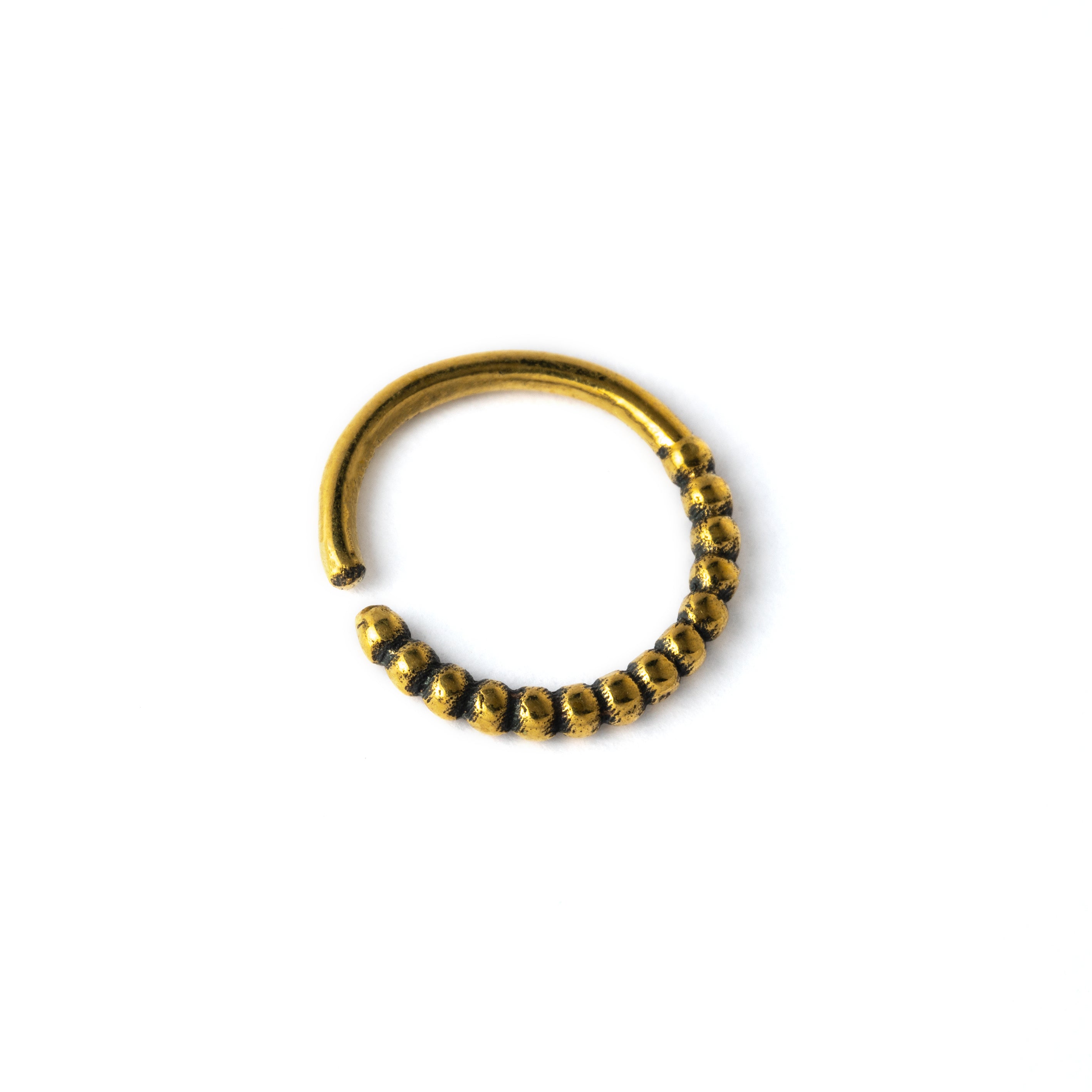 Ravi golden brass septum ring left side view