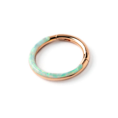 Rose Gold surgical steel septum clicker ring with white opal inlay left side view