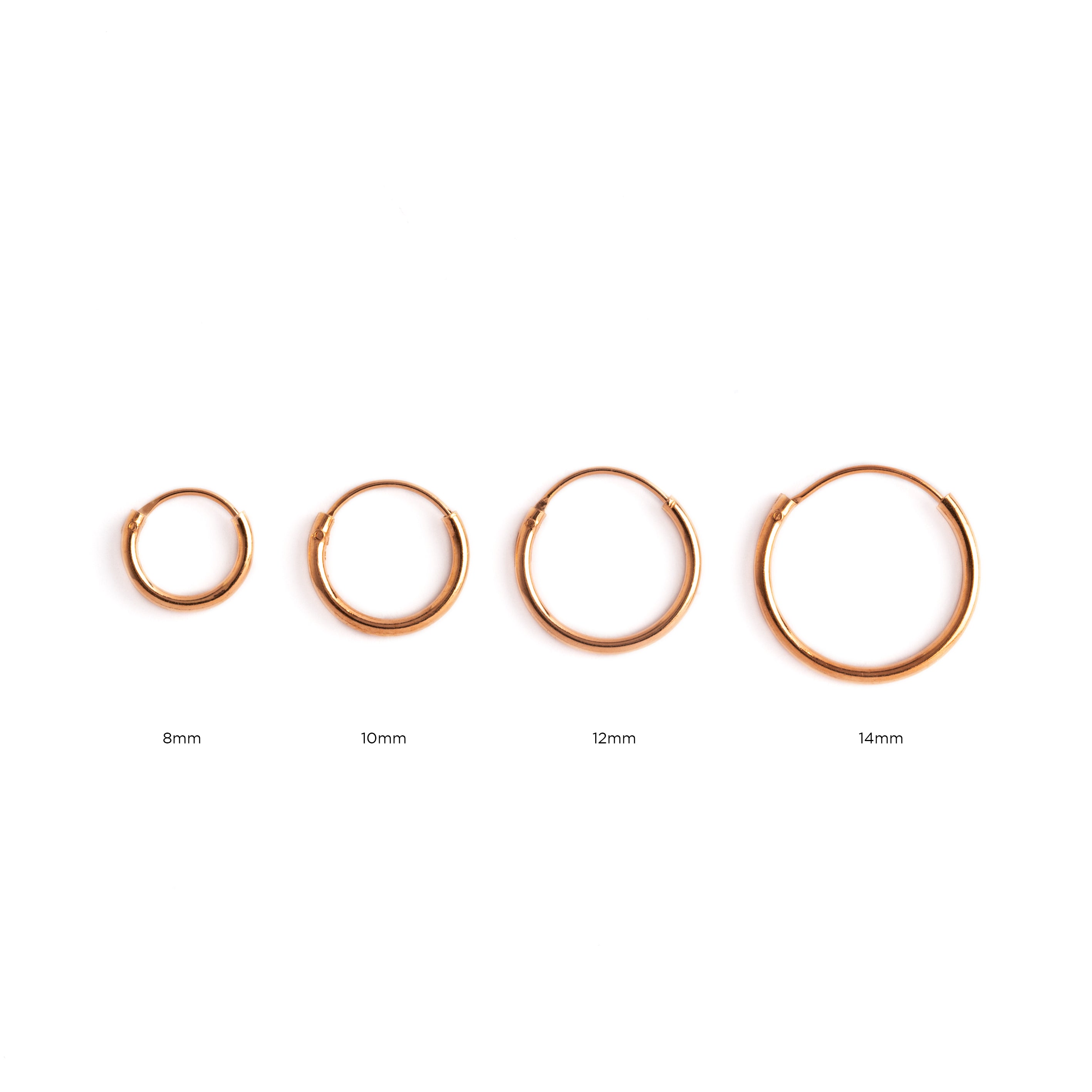 all sizes rose gold hoop earrings frontal view