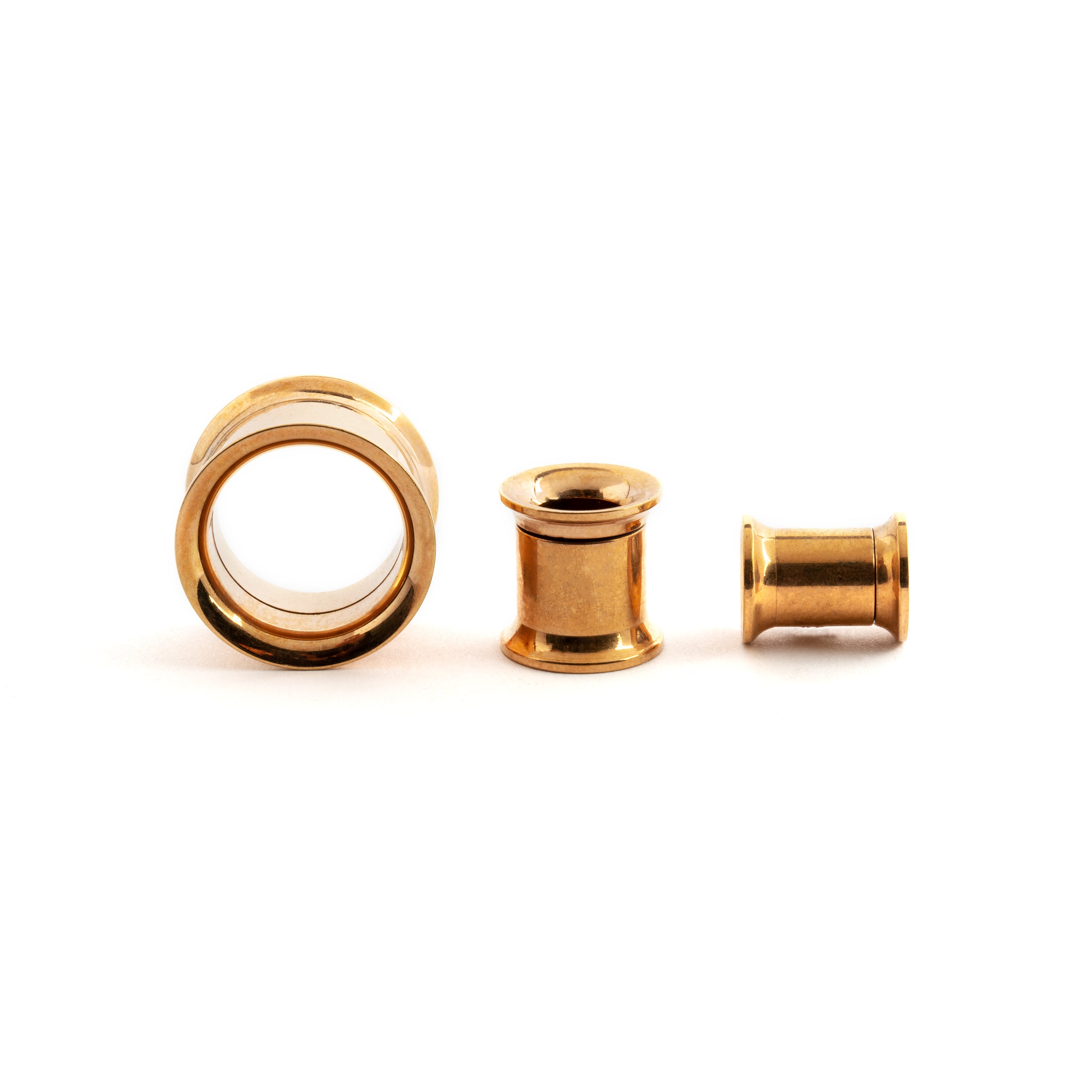 several sizes off Rose Gold surgical steel ear tunnels front and sideview