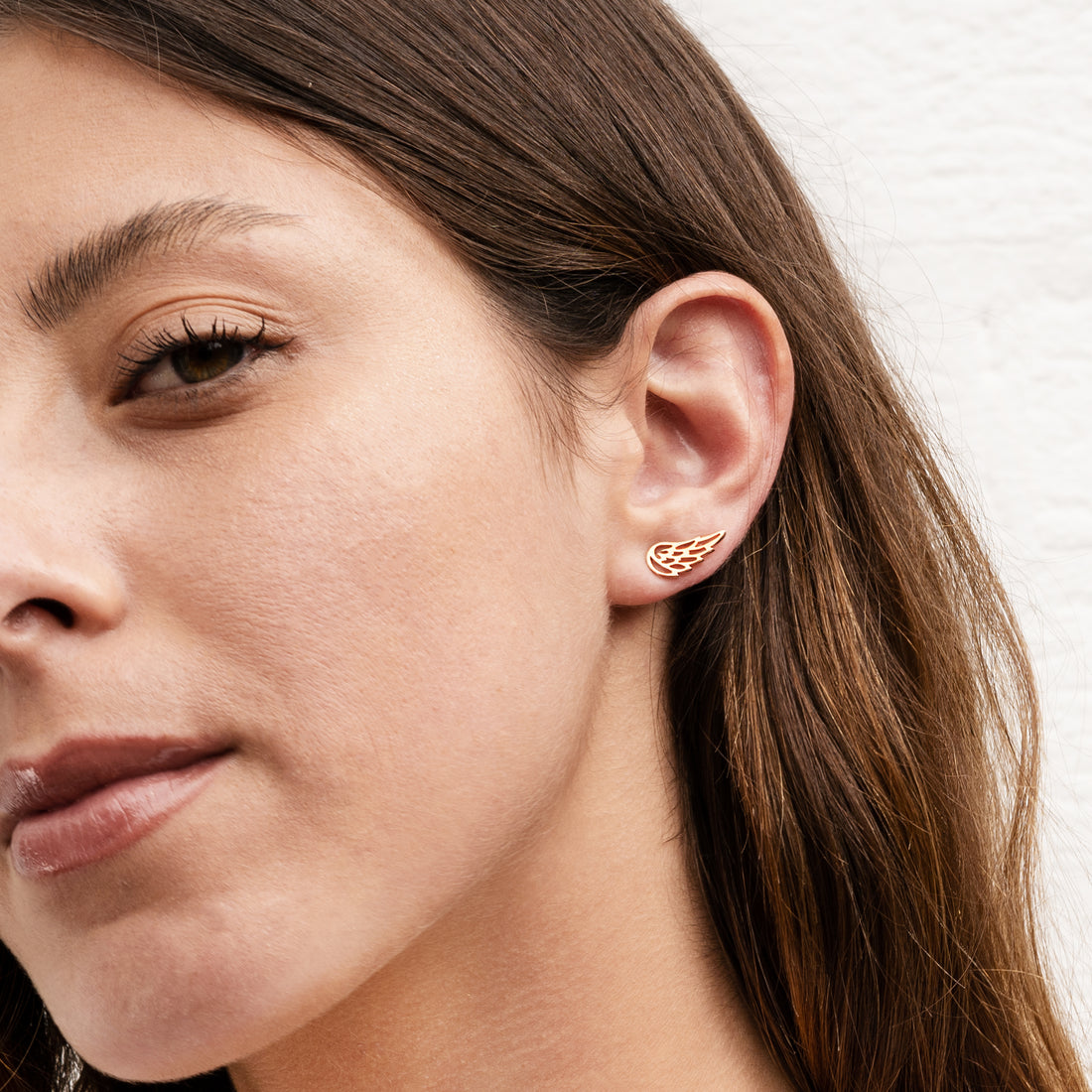 Rose Gold Wing Ear Studs | Tribu London