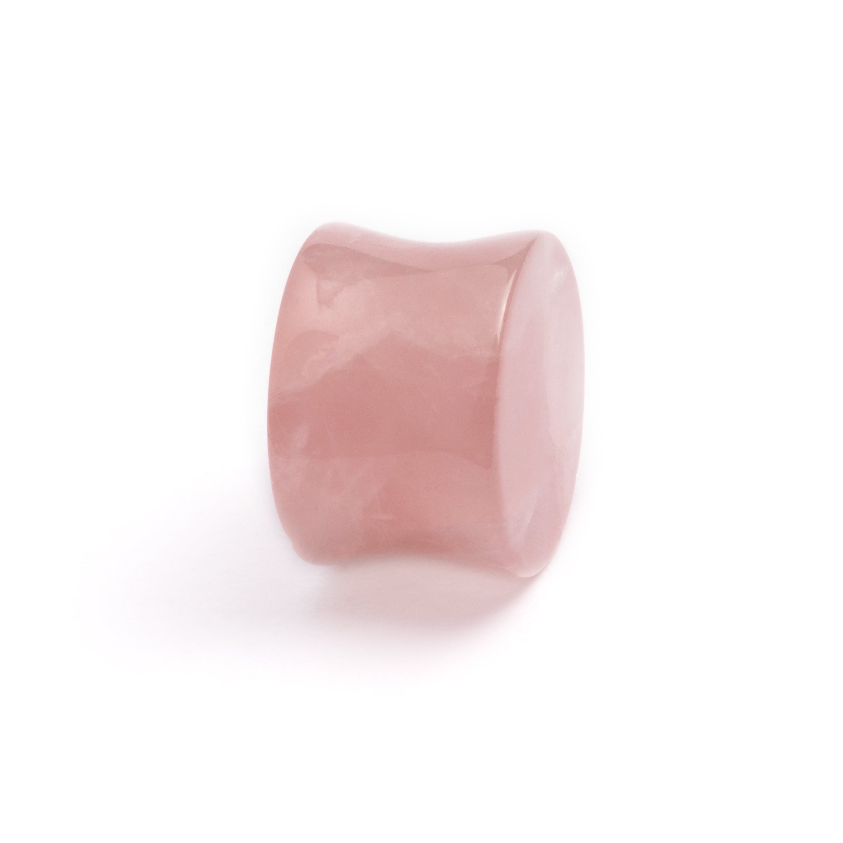 single rose quartz double flare stone ear plug side view