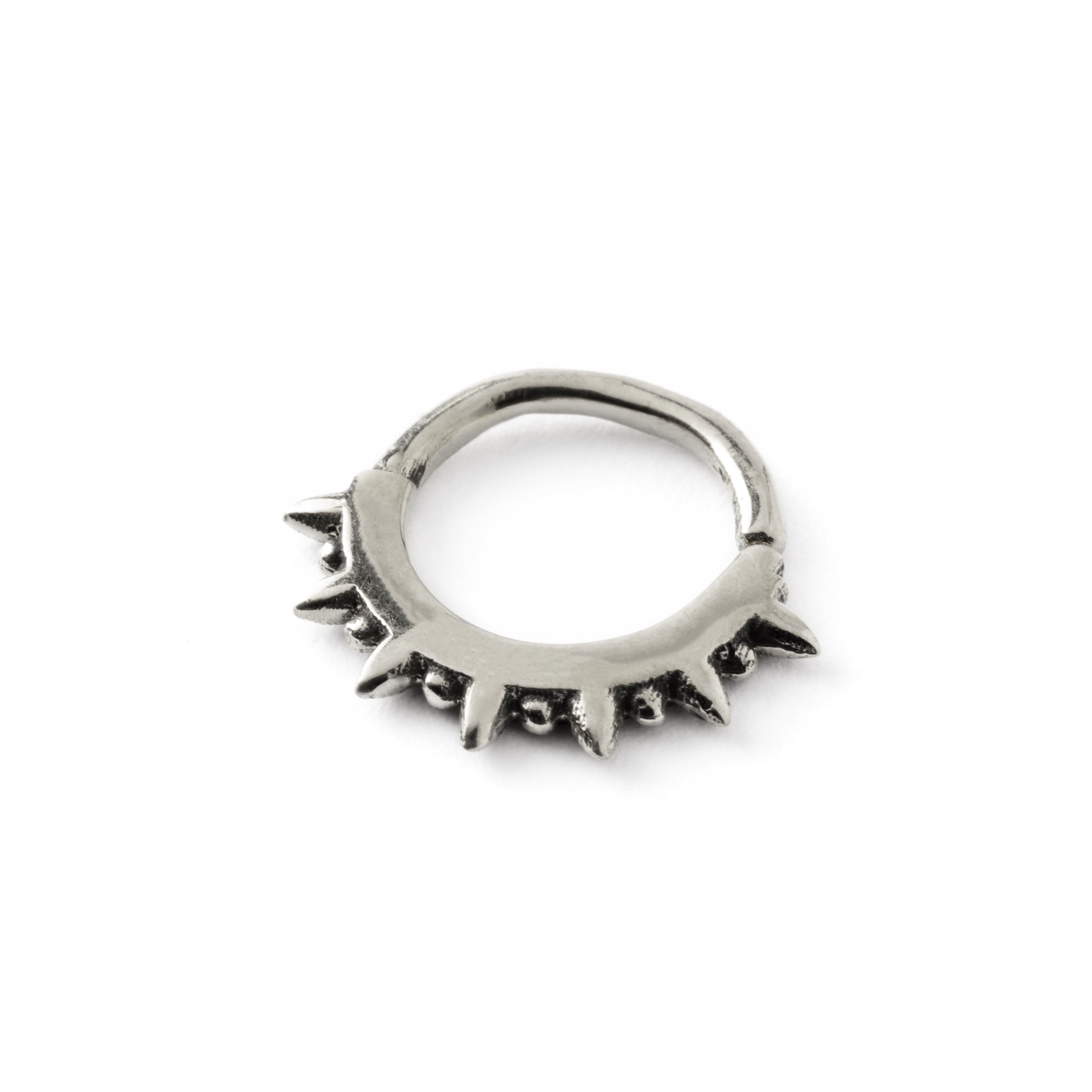 Shani silver septum ring with spiky ends left side view