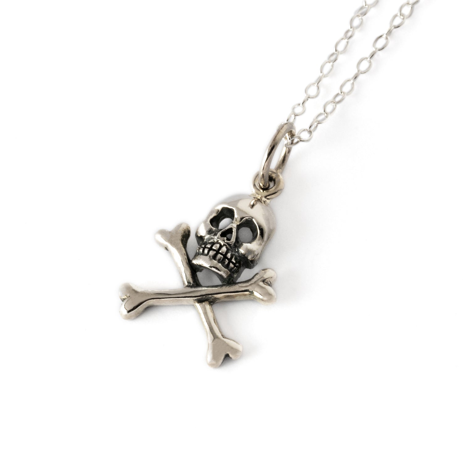 silver crossbones skull charm necklace left side view