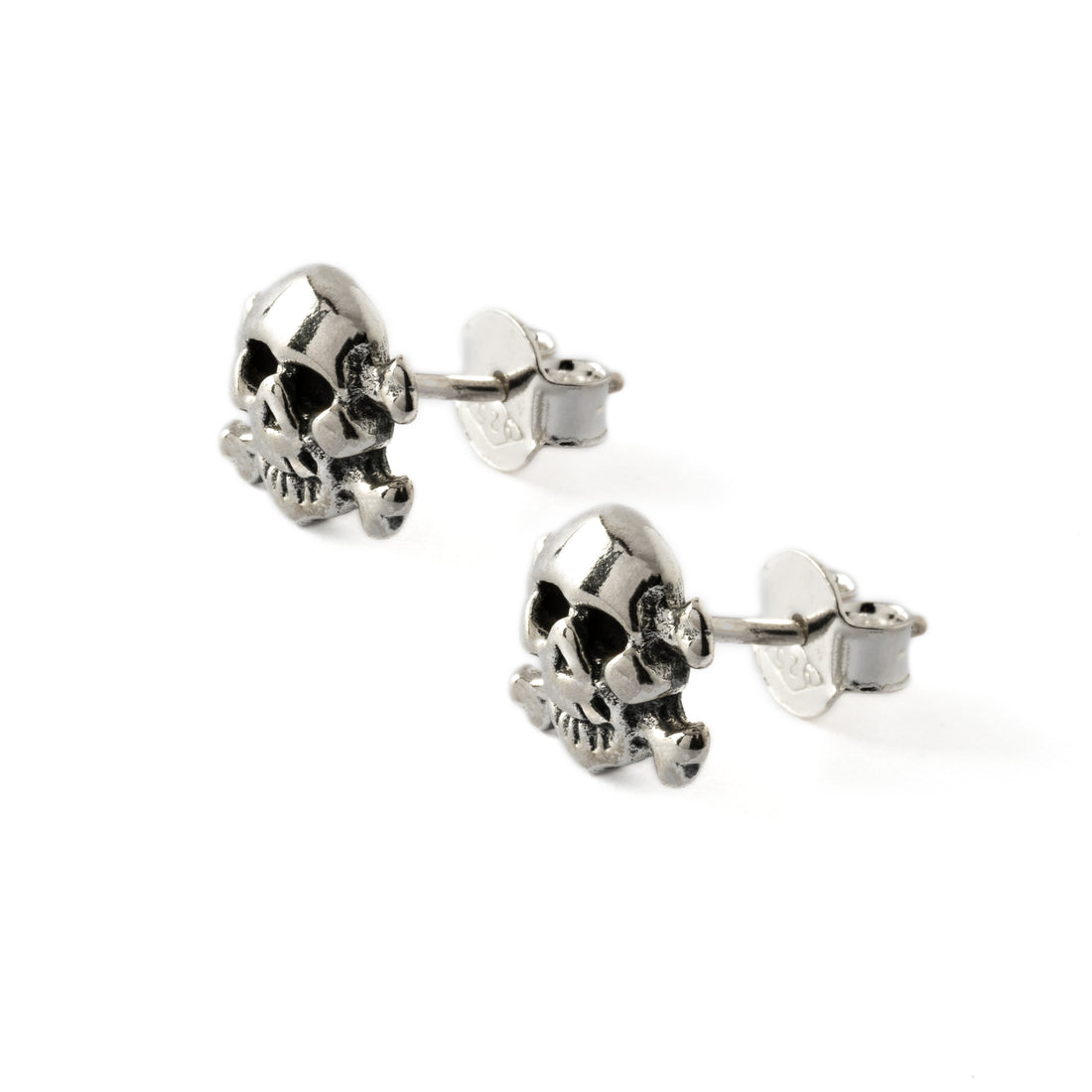 pair of silver pirate stud earrings left side view
