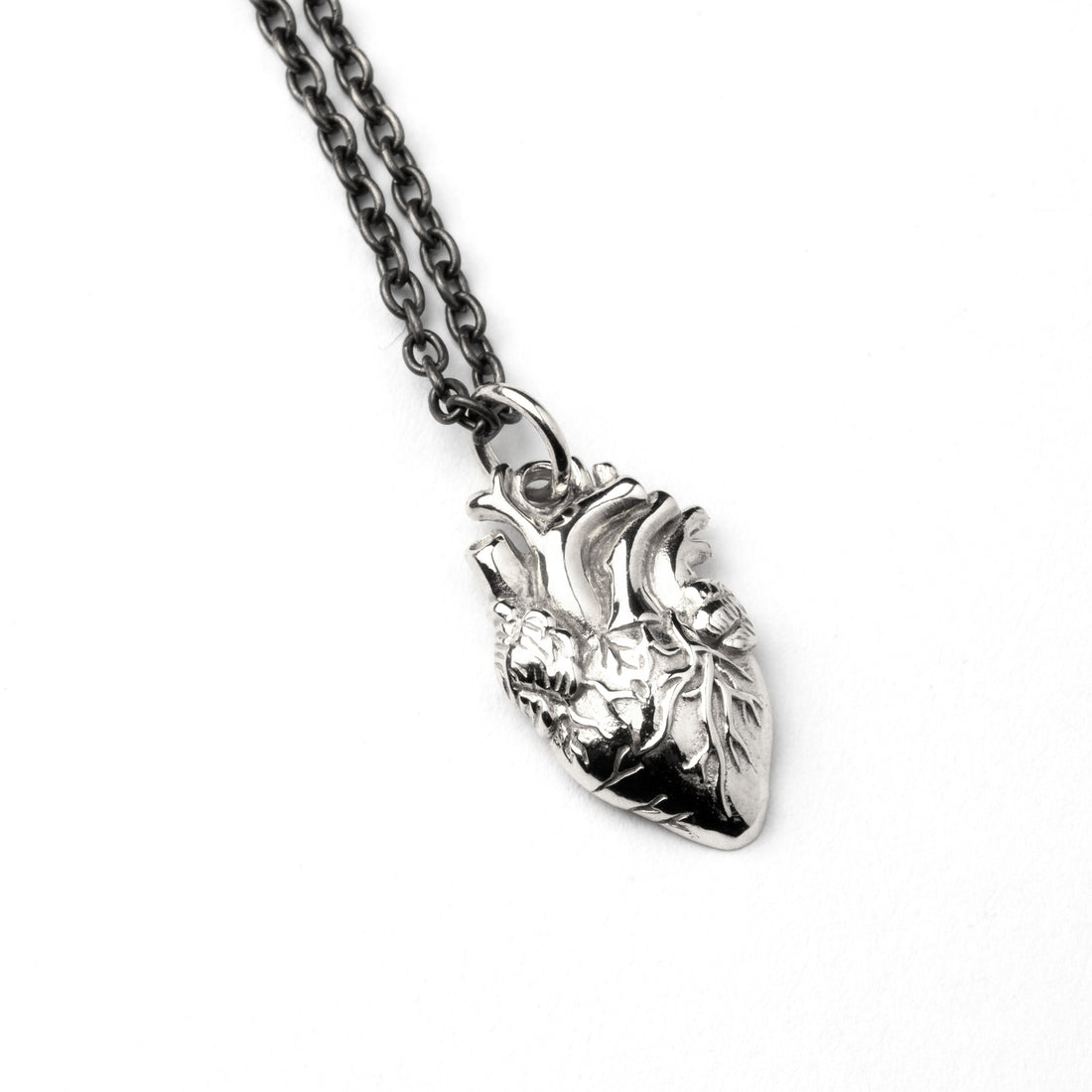 sterling silver anatomical heart charm necklace on a silver chain