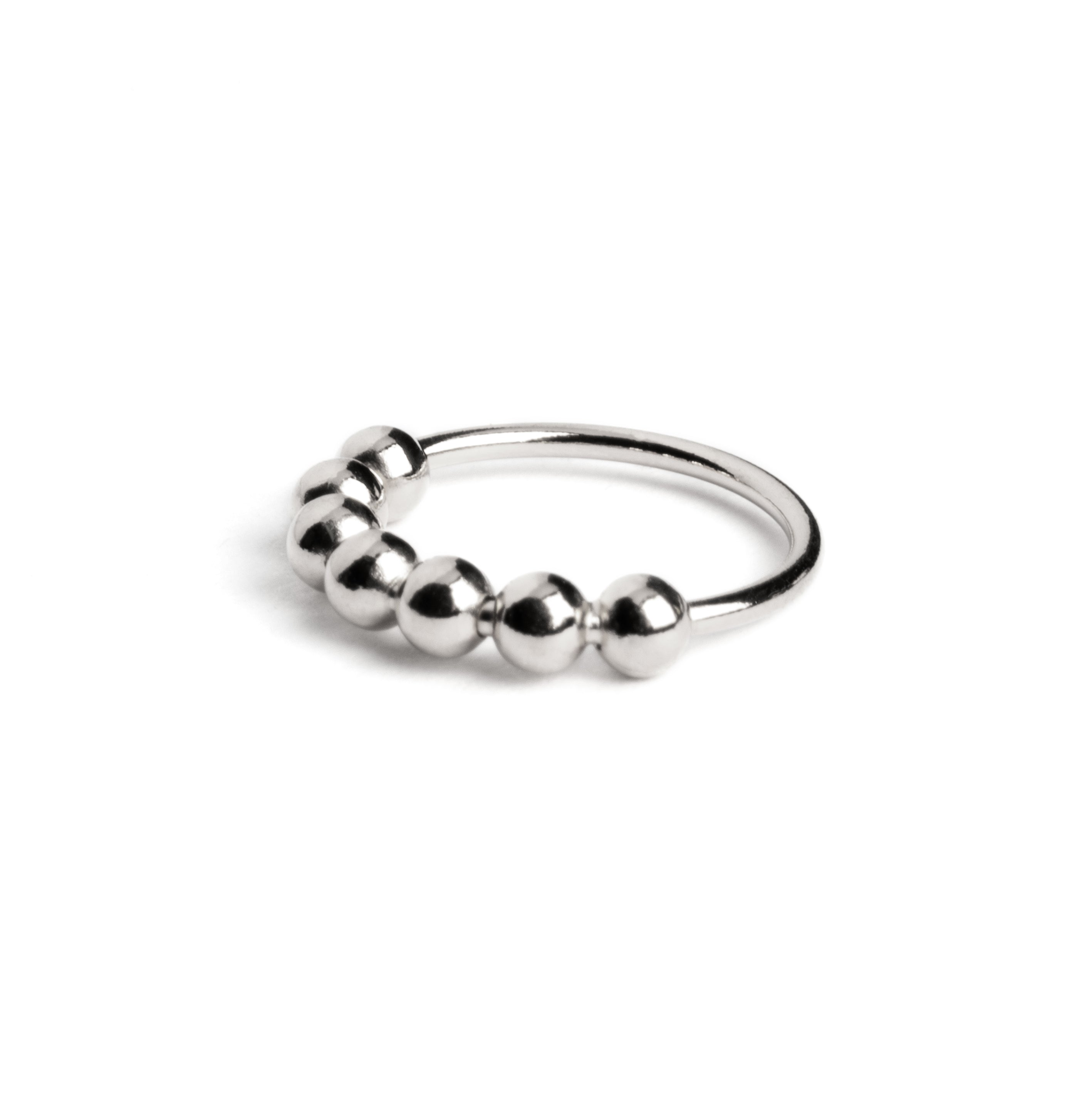 Silver beaded nose ring side view