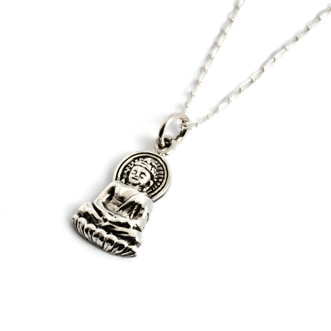 silver tiny sitting buddha charm necklace on a silver chain side view