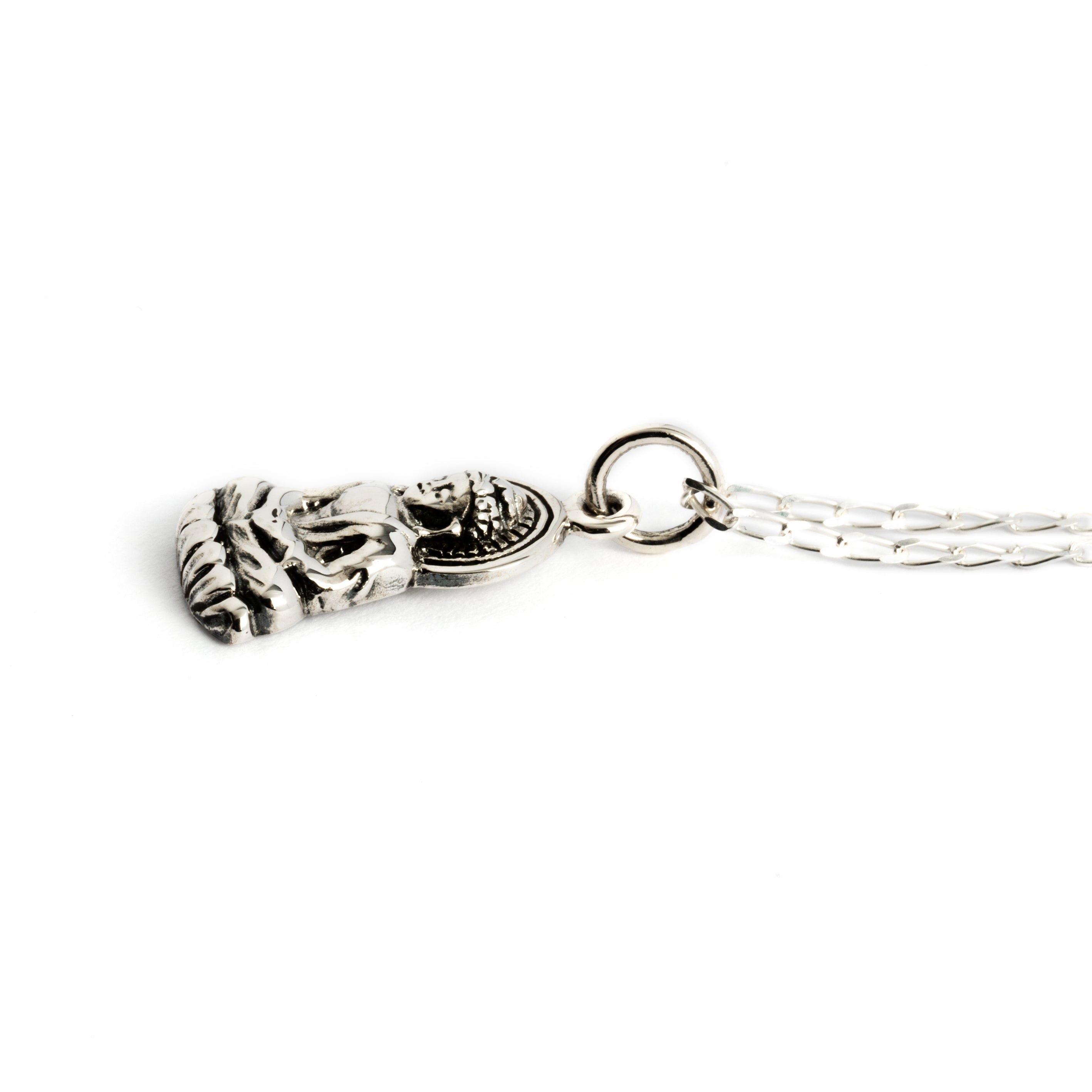 silver tiny sitting buddha charm necklace on a silver chain down view
