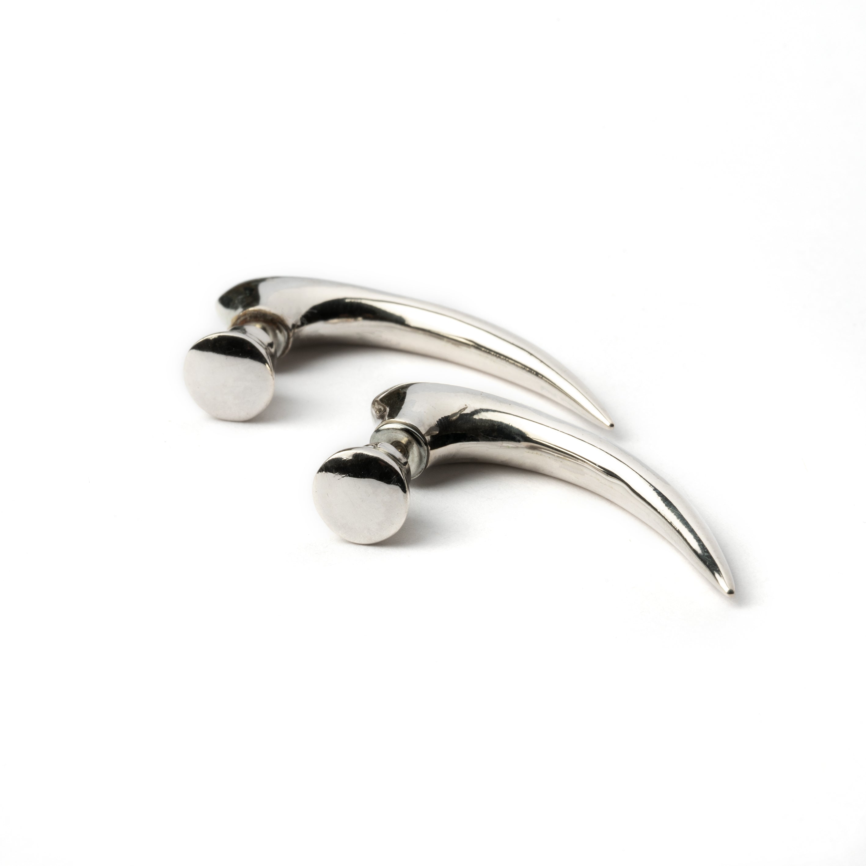pair of Silver talon spike fake gauge earrings frontal view