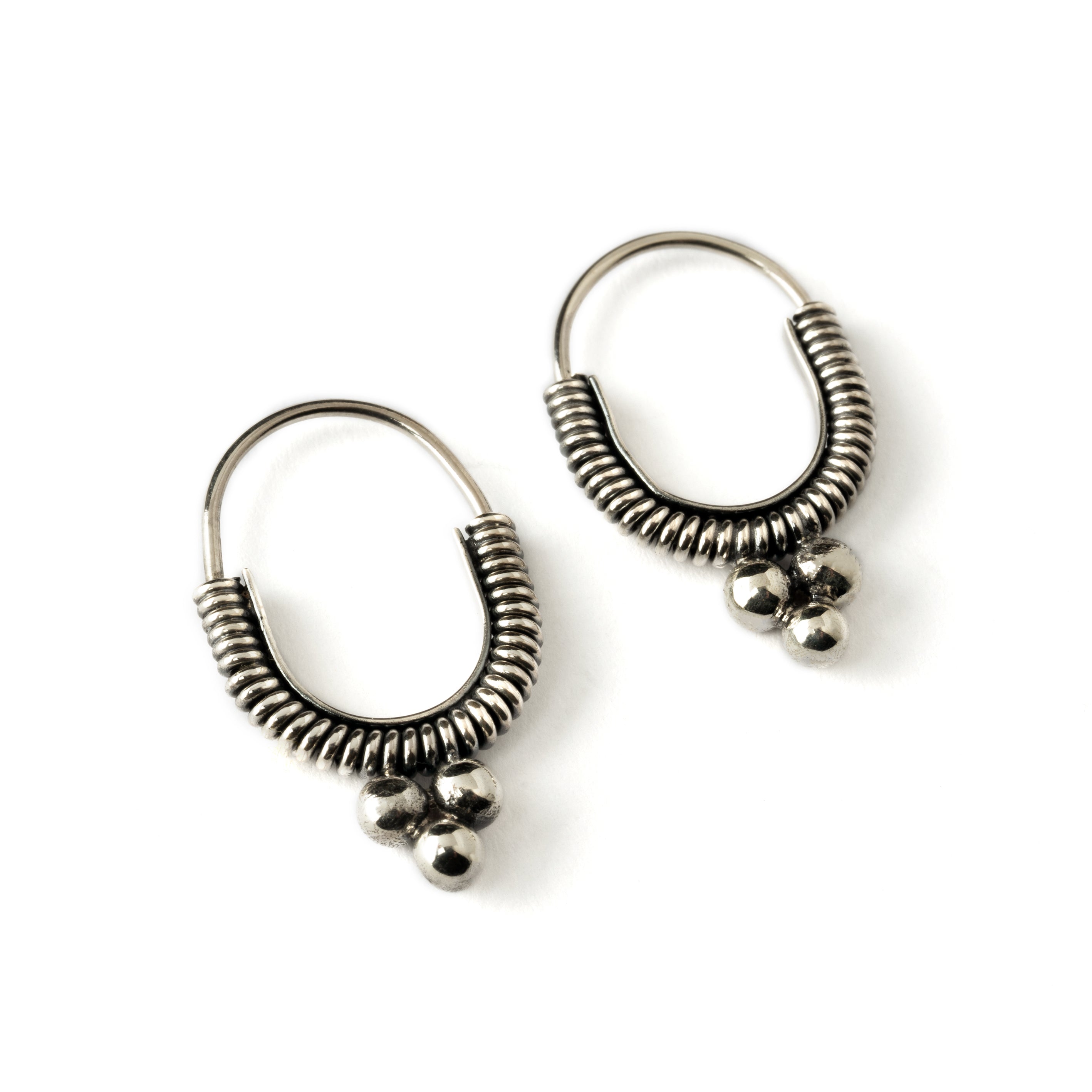 ethnic Silver coiled oval hoop earrings right side view