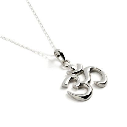 Silver Om charm necklace left side view