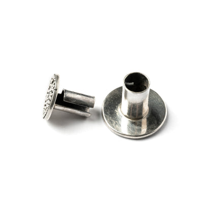 single tribal screw on silver plug tunnel ornamented with spheres closure system view