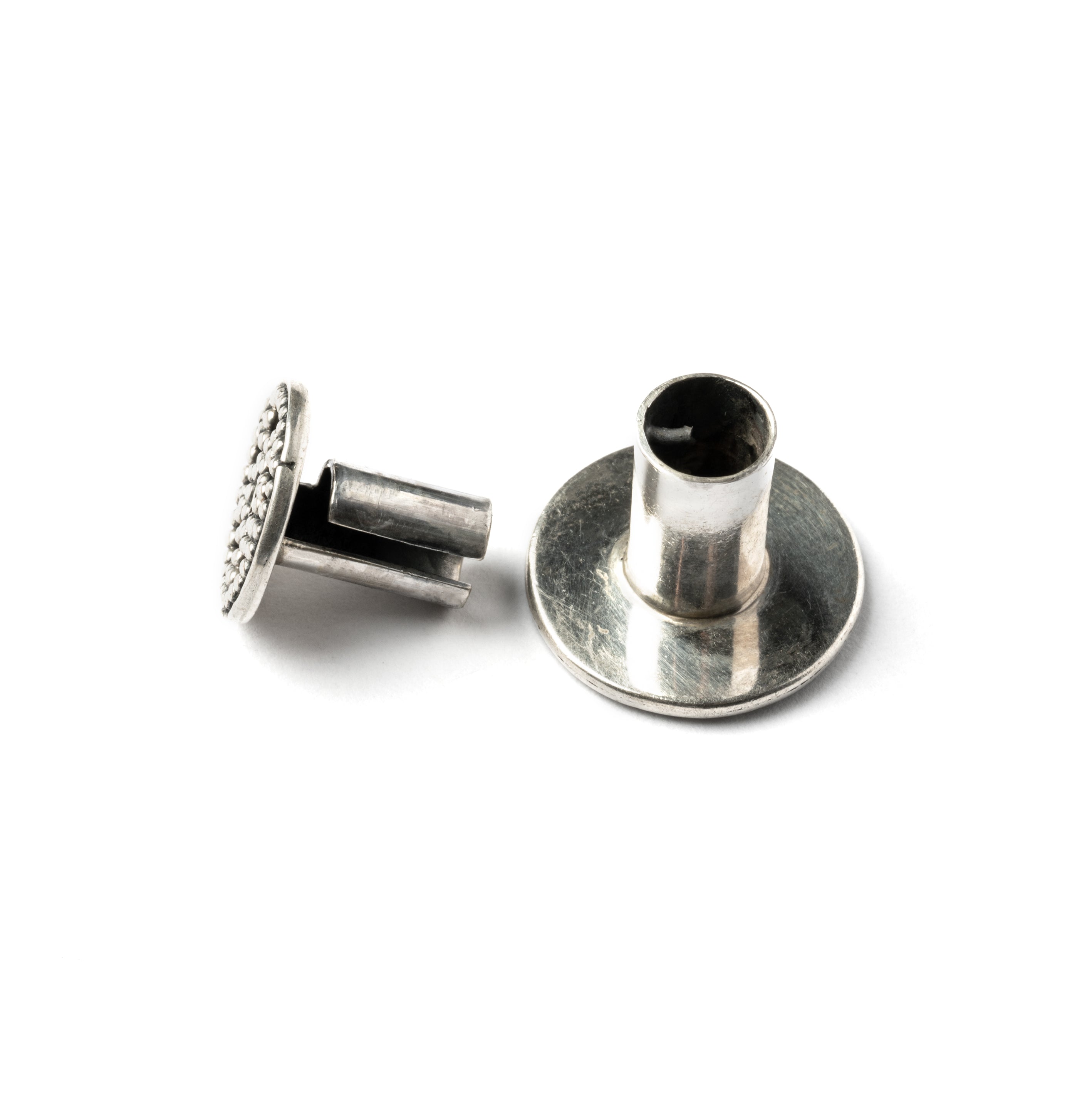 single tribal screw on silver plug tunnel ornamented with spheres closure system view