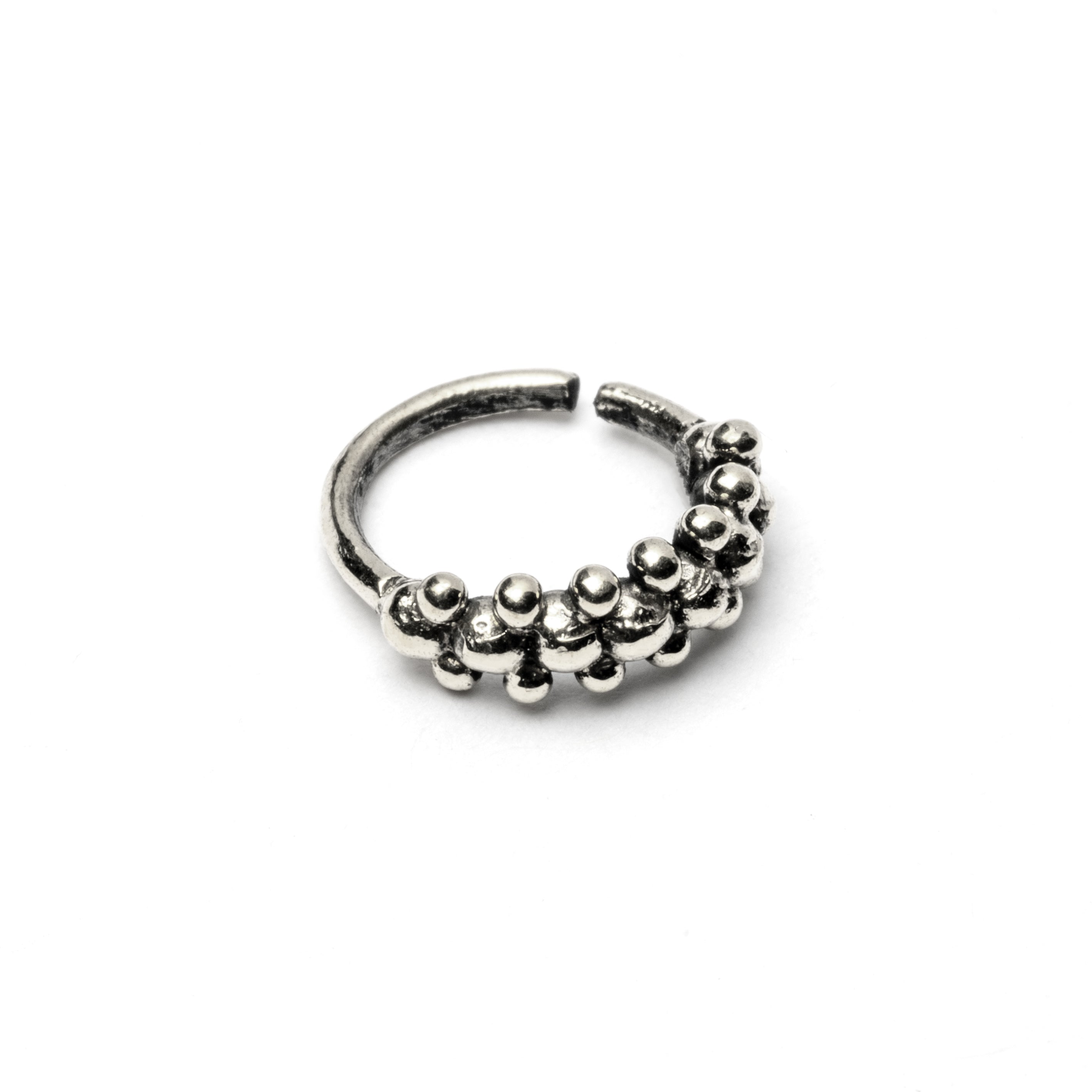 Double dotted silver nose ring left side view