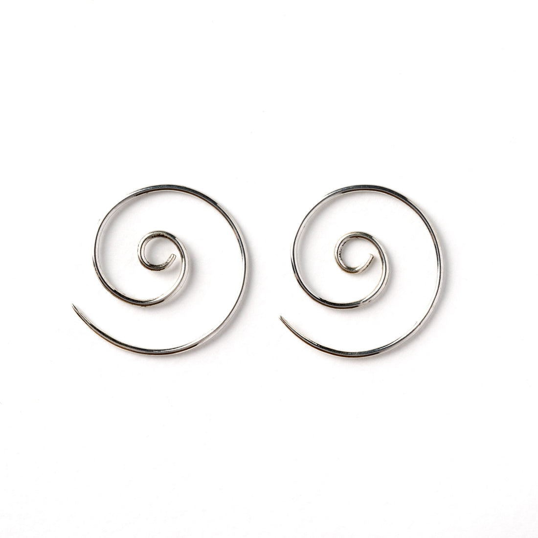 pair of silver spiral wire earrings side view