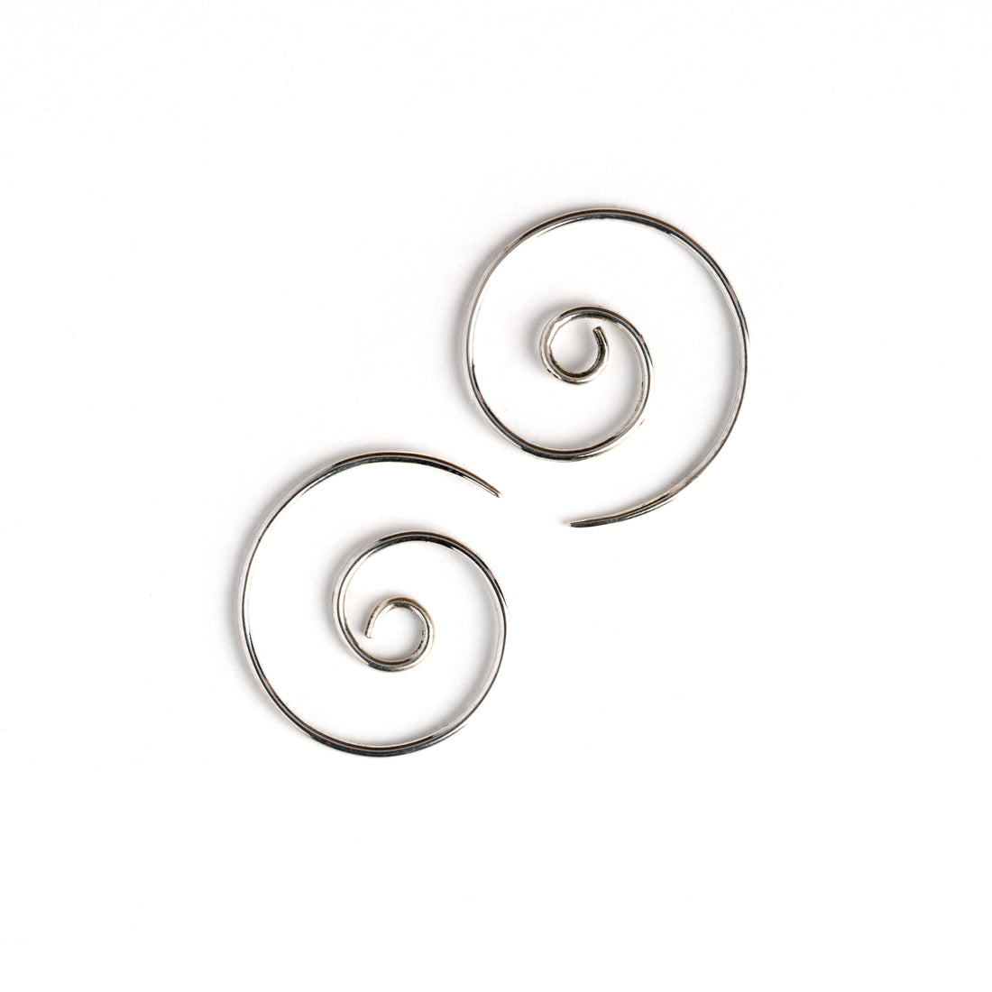 pair of silver spiral wire earrings side view