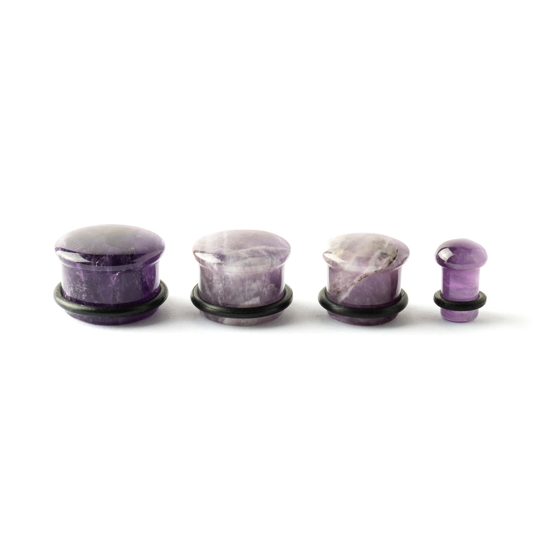 several sizes of Single Flare Amethyst stone ear plugs side and front view