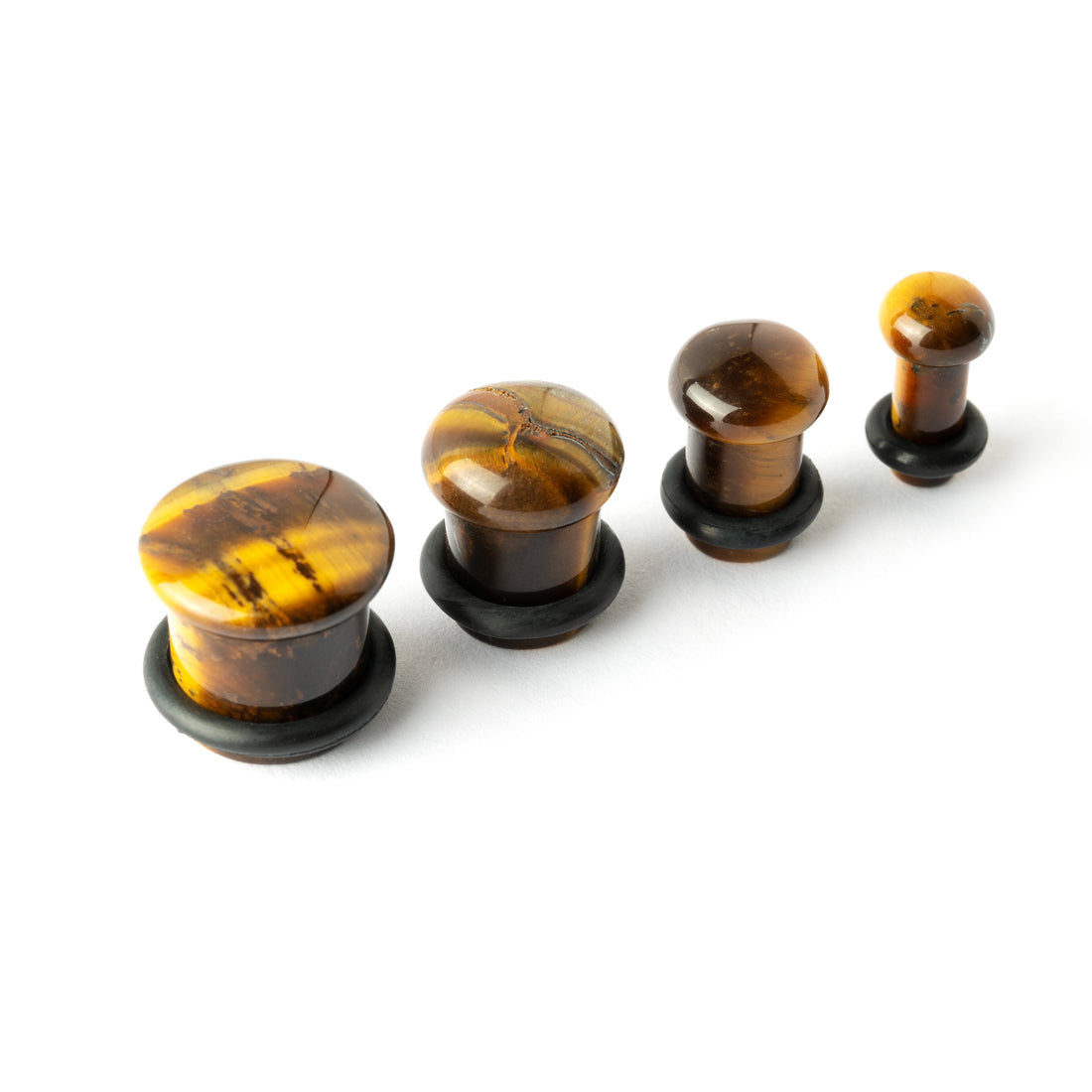 several sizes of Single Flare Tiger Eye stone ear plugs front and side view