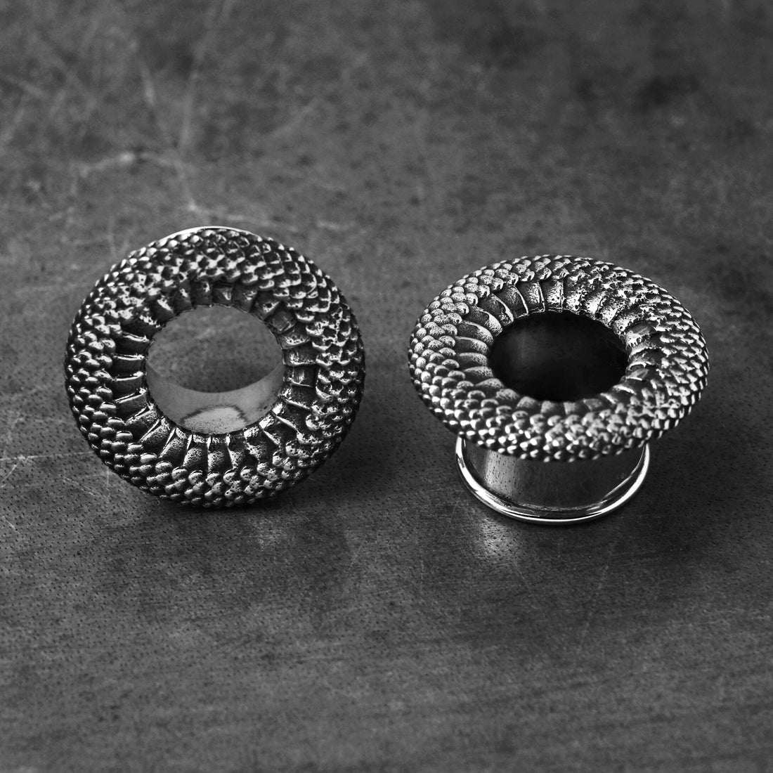 Snakes skin texture silver plug tunnels