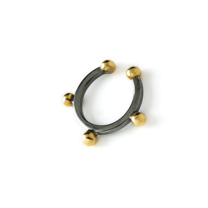 black oxidised silver ear cuff with five tiny golden spheres around the outer ring left side view
