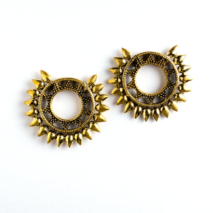 pair of gold brass tribal spiky ear weights hoops frontal view