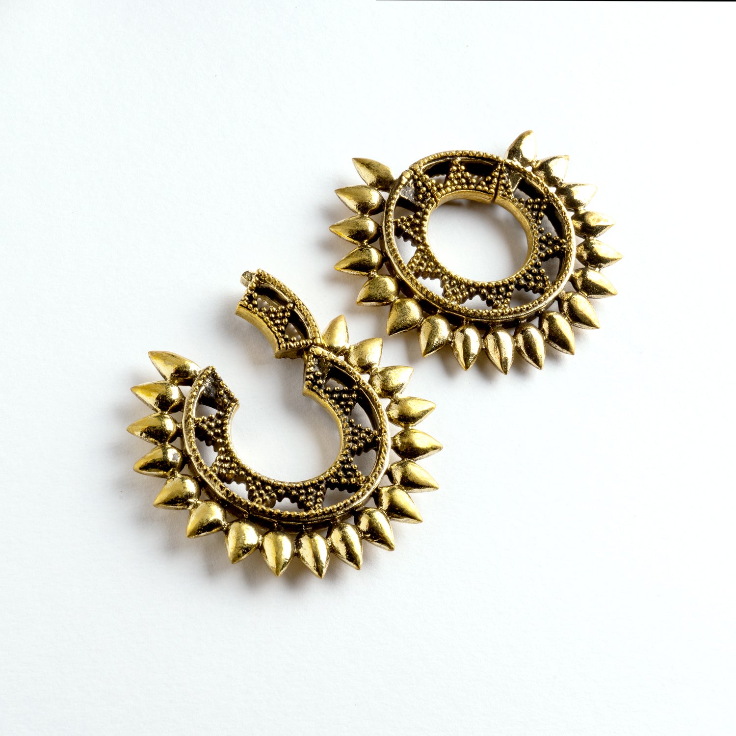 pair of gold brass tribal spiky ear weights hoops side locking system view