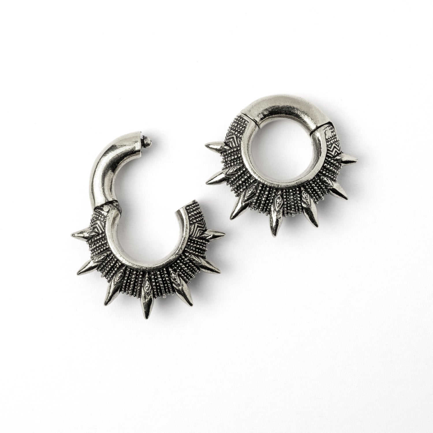pair of silver colour spiky ear weights hoops