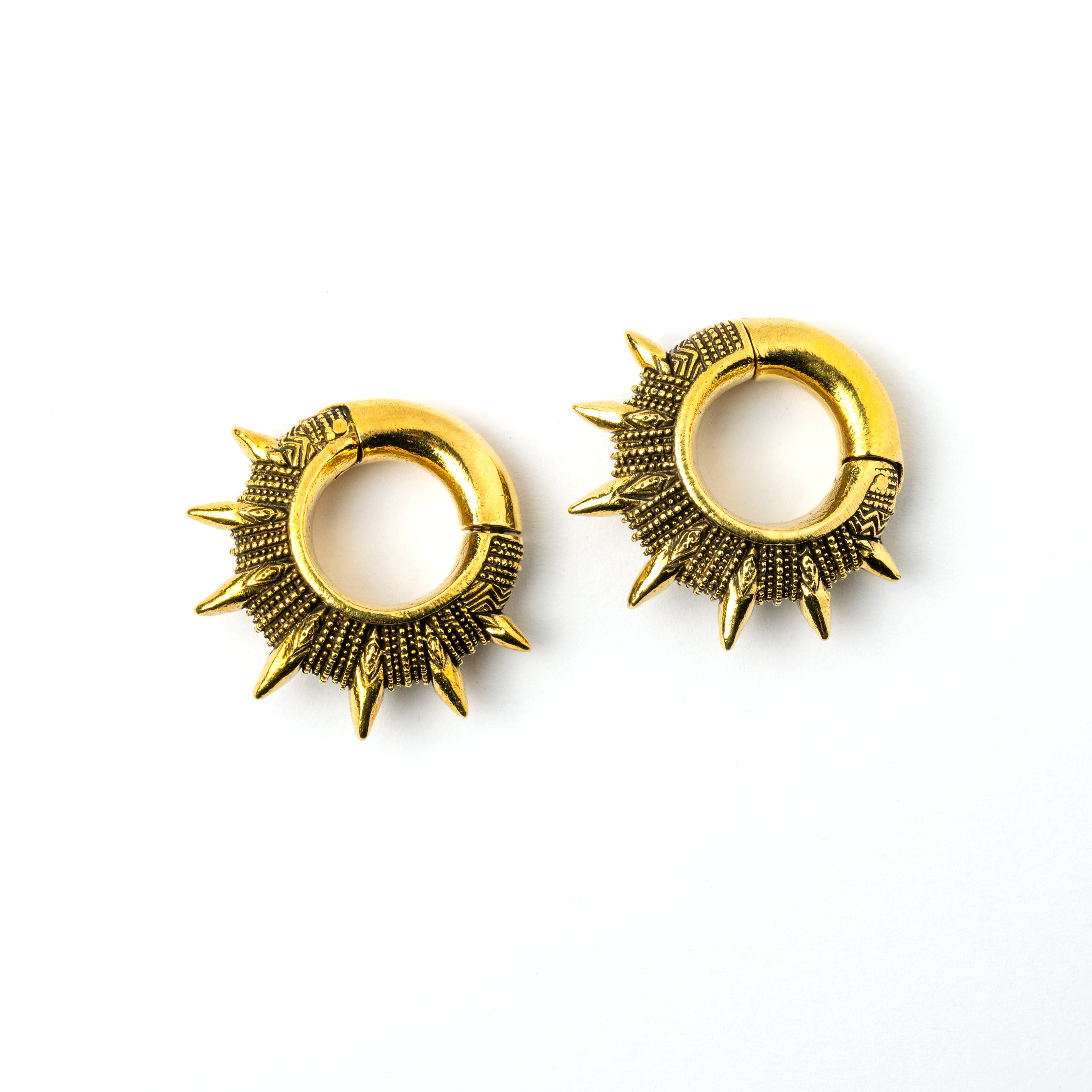 pair of golden spiky ear weights hoops right side view