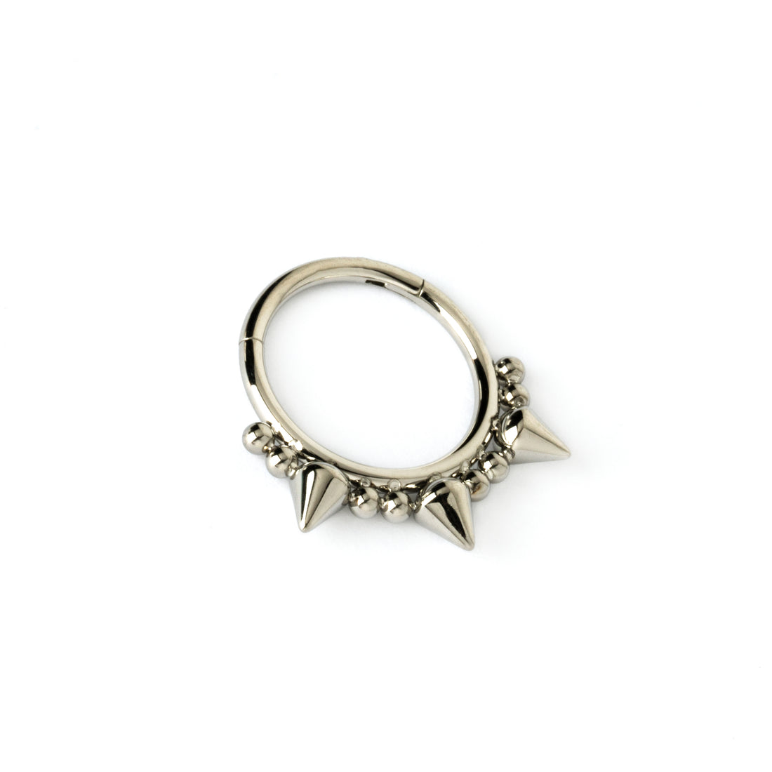 surgical steel clicker ring ornamented with spheres and spikes right side view